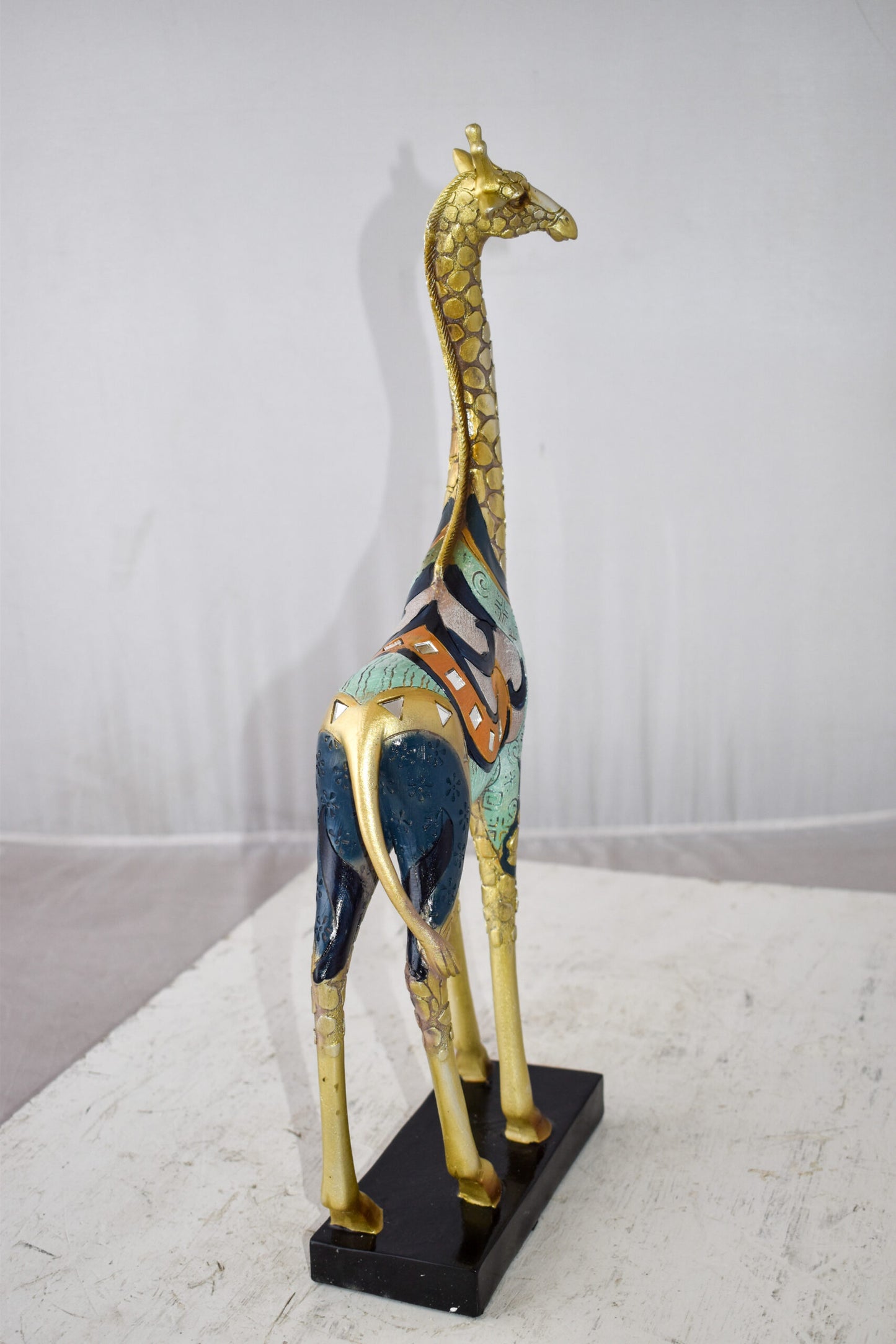 Giraffe Looking Around Colorful Resin Tabletop Statue Size: 3" x 8" x 20"H