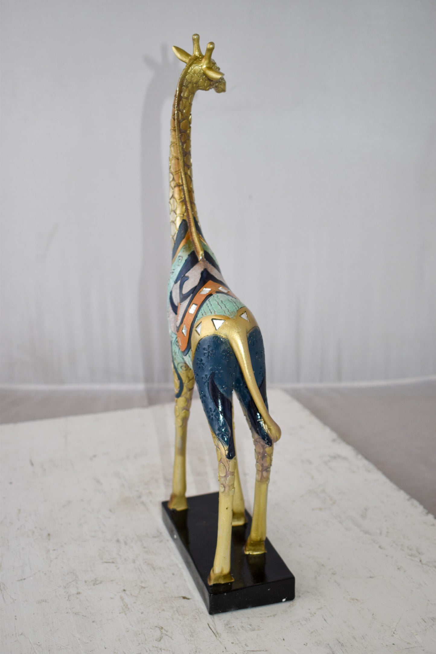 Giraffe Looking Around Colorful Resin Tabletop Statue Size: 3" x 8" x 20"H