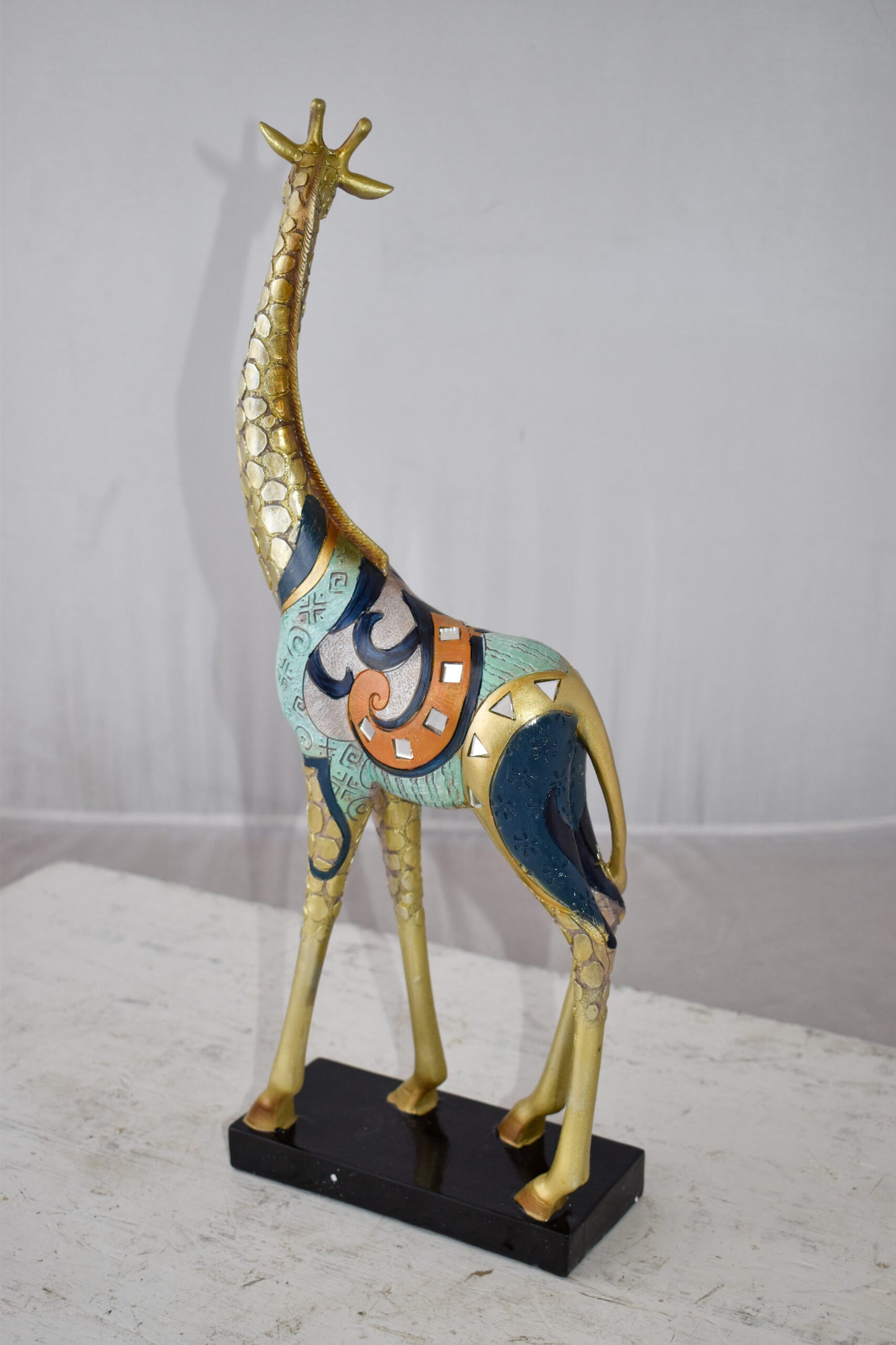 Giraffe Looking Around Colorful Resin Tabletop Statue Size: 3" x 8" x 20"H