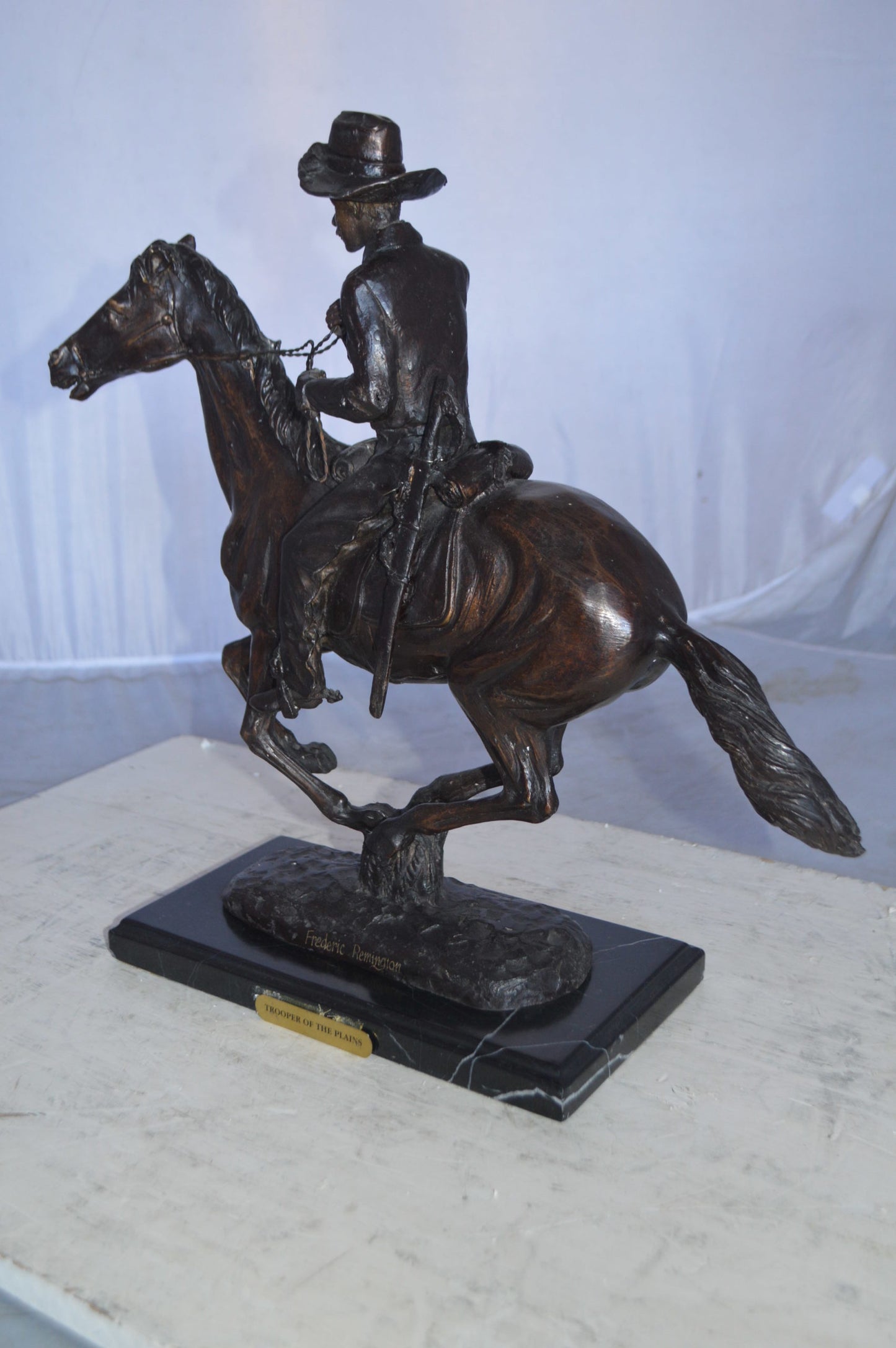 Trooper of the plains Bronze replica by Remington - Size: 17"L x 6"W x 18"H.