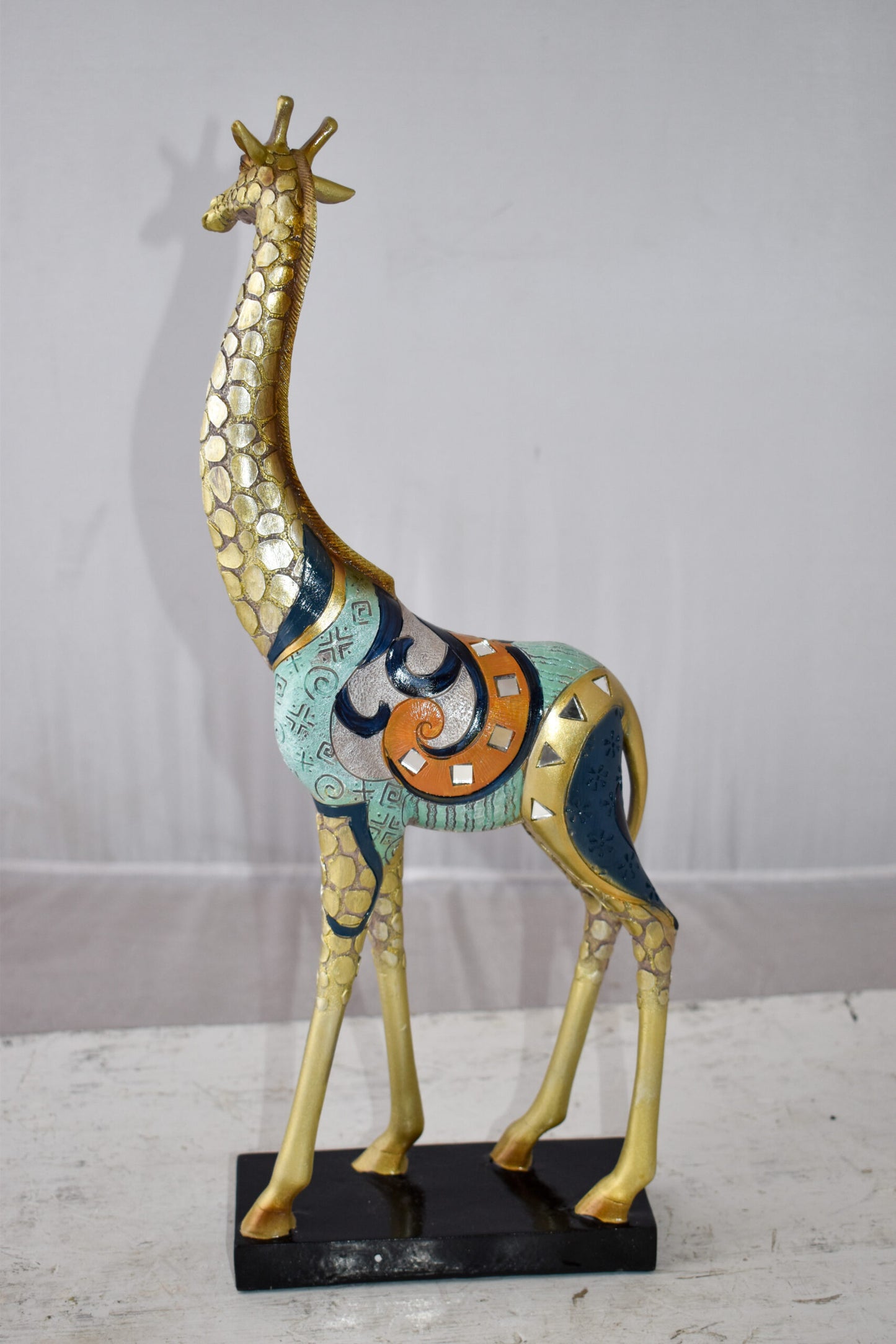 Giraffe Looking Around Colorful Resin Tabletop Statue Size: 3" x 8" x 20"H