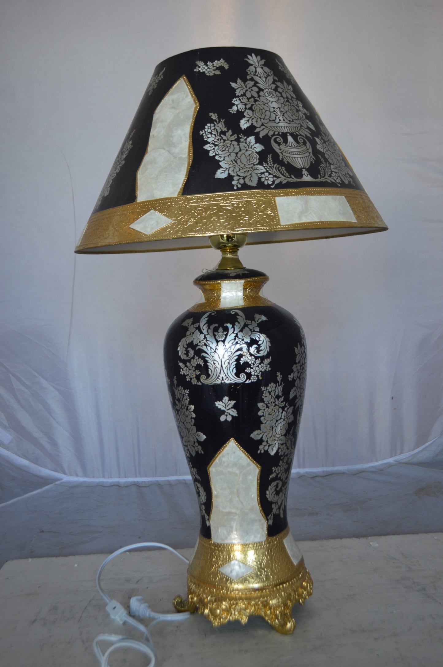 Gold and Silver lamp made of resin - Size: 18"L x 18"W x 30"H.