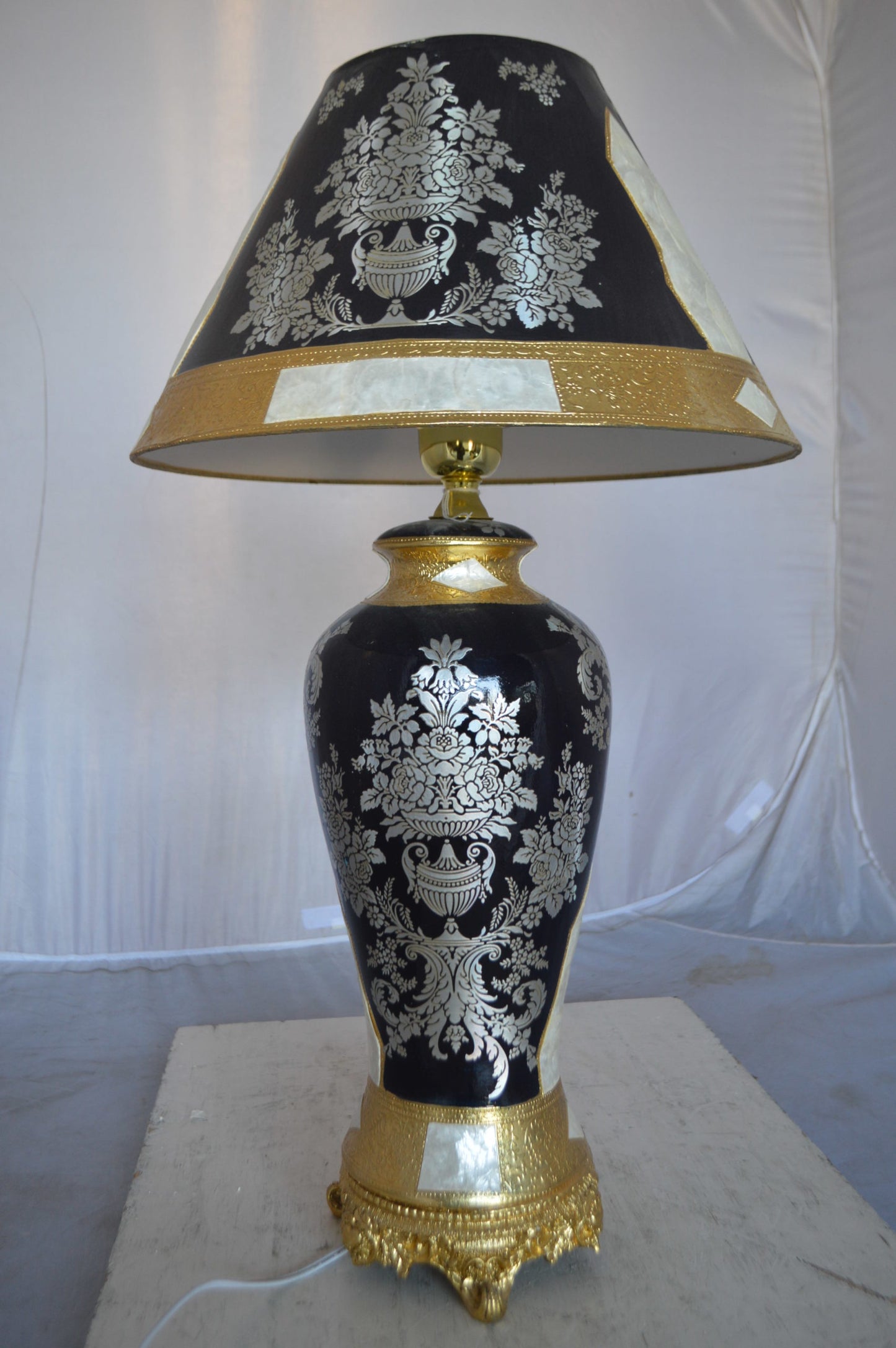 Gold and Silver lamp made of resin -  Size: 18"L x 18"W x 30"H.