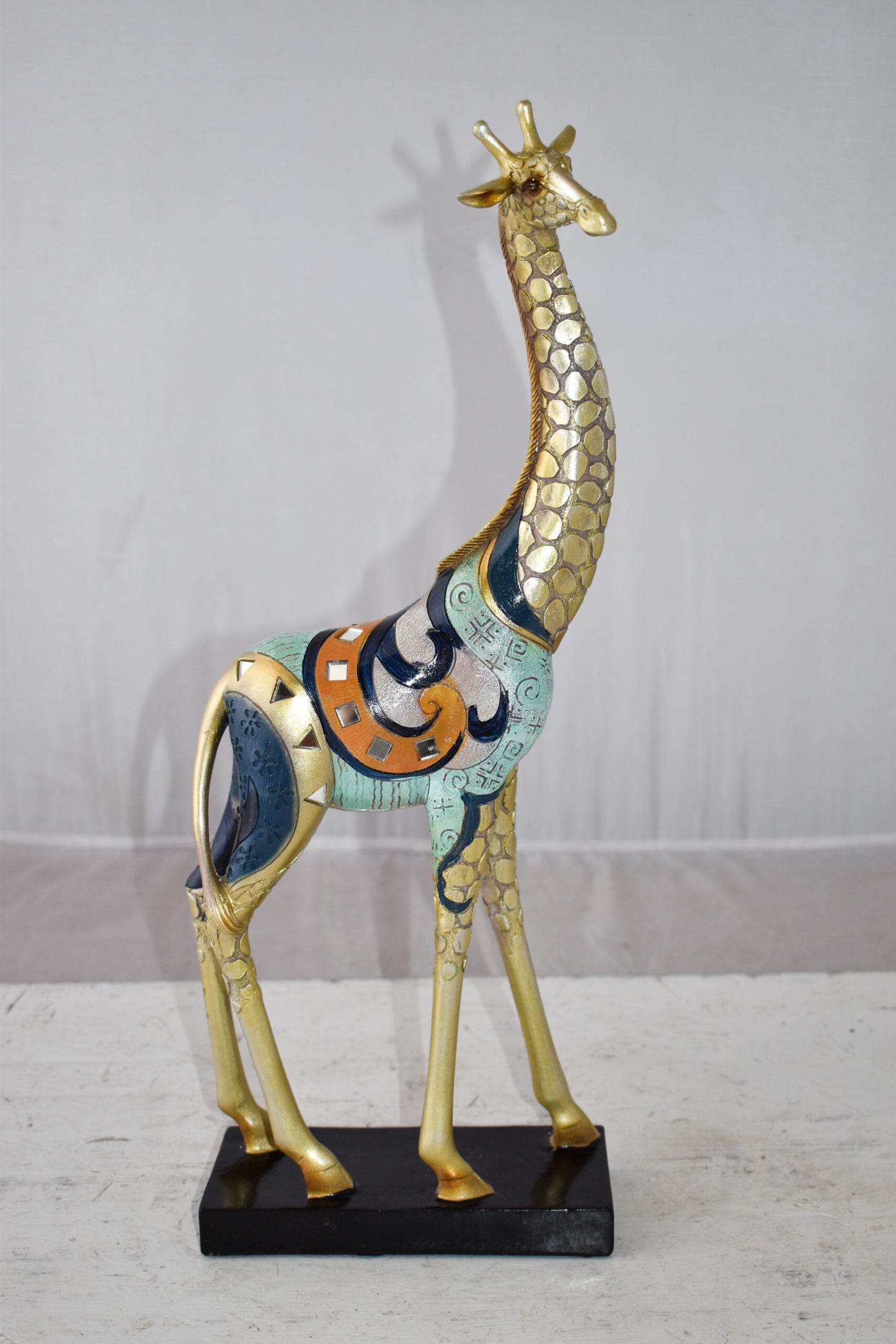 Giraffe Looking Around Colorful Resin Tabletop Statue Size: 3" x 8" x 20"H