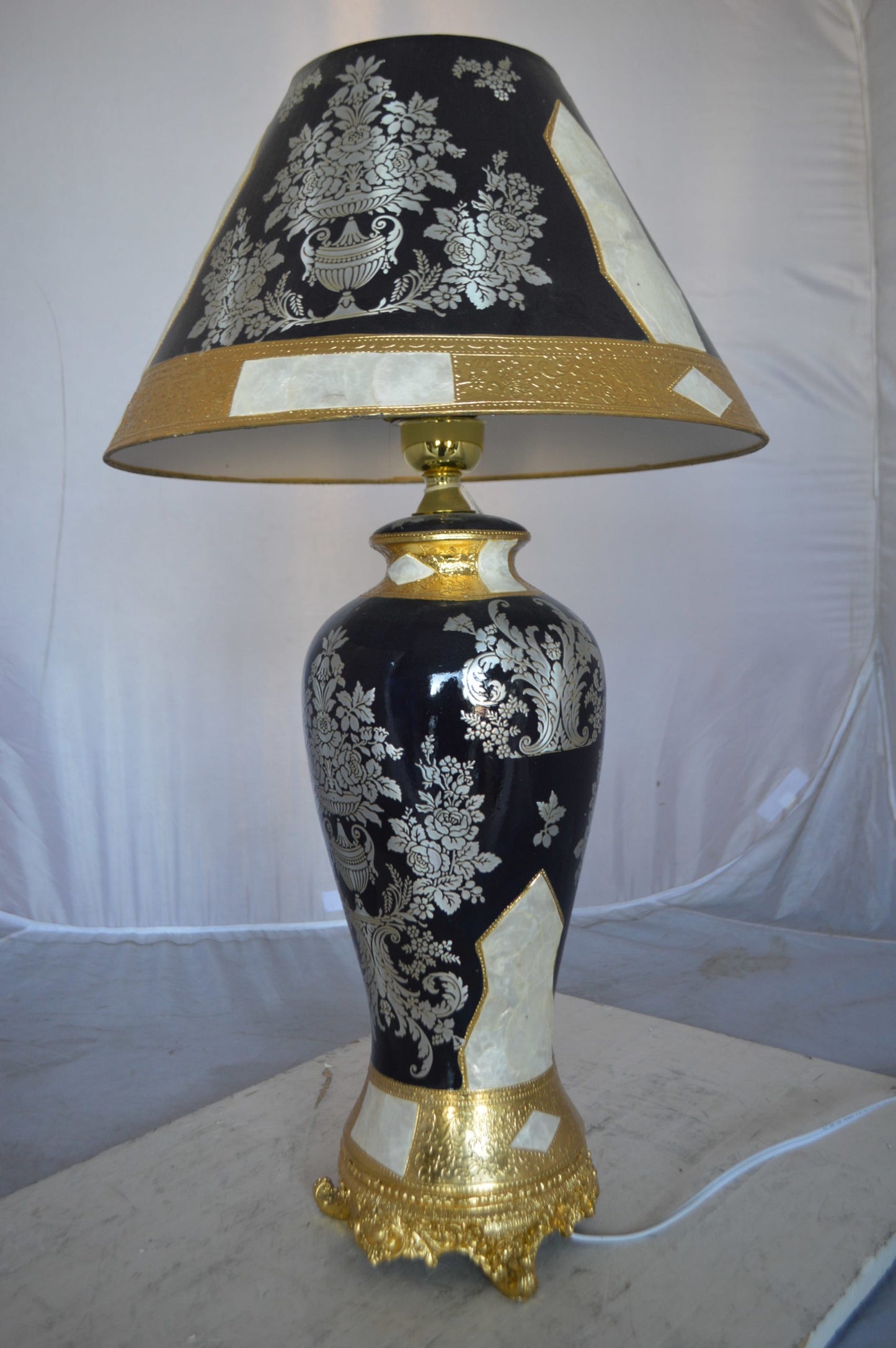 Gold and Silver lamp made of resin - Size: 18"L x 18"W x 30"H.
