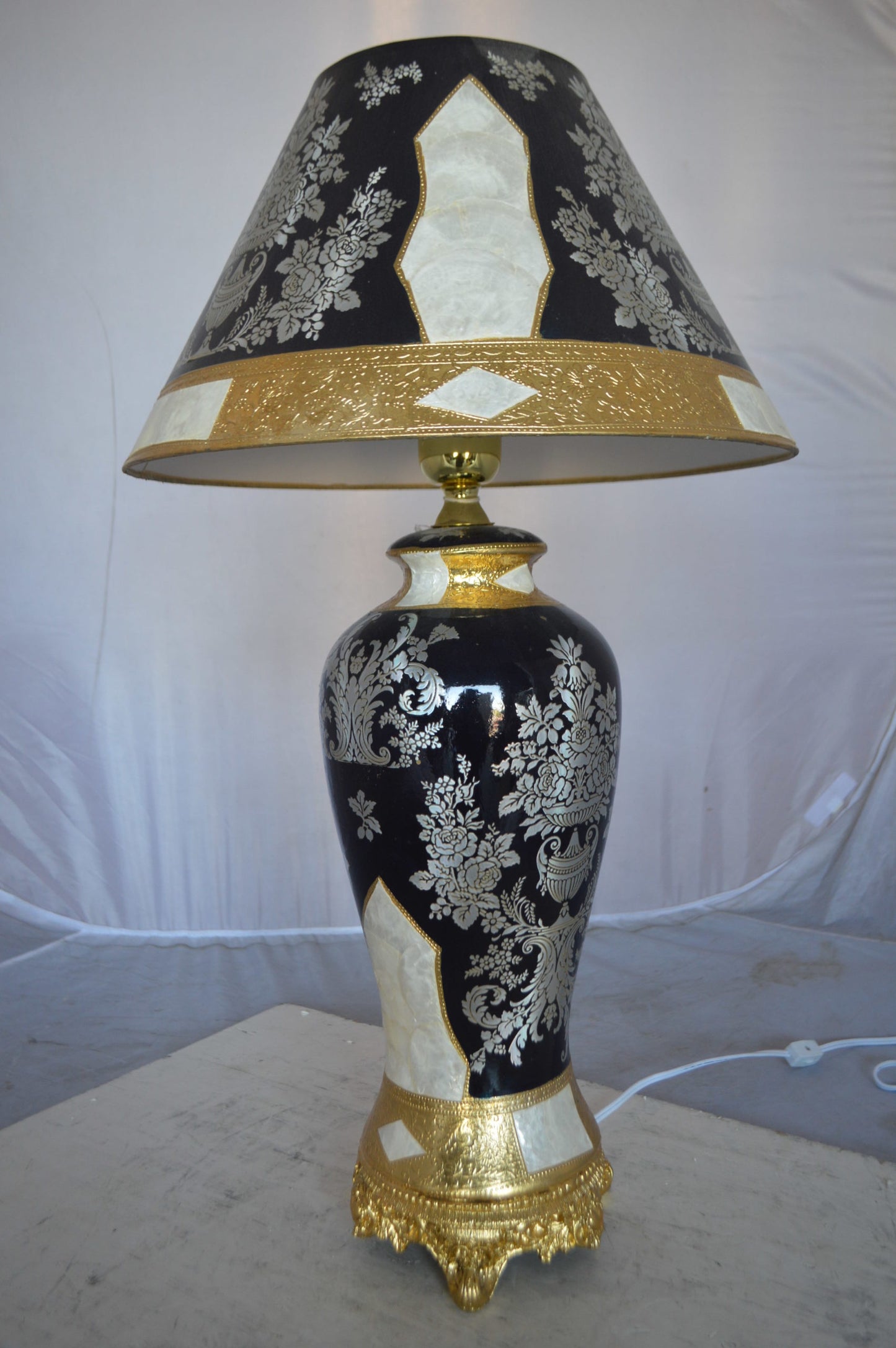 Gold and Silver lamp made of resin -  Size: 18"L x 18"W x 30"H.
