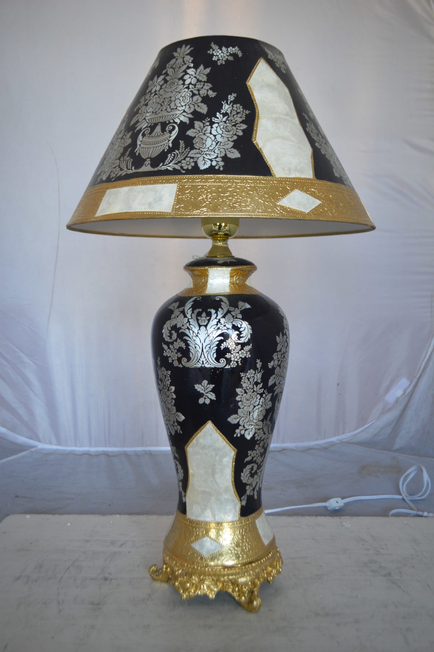 Gold and Silver lamp made of resin - Size: 18"L x 18"W x 30"H.