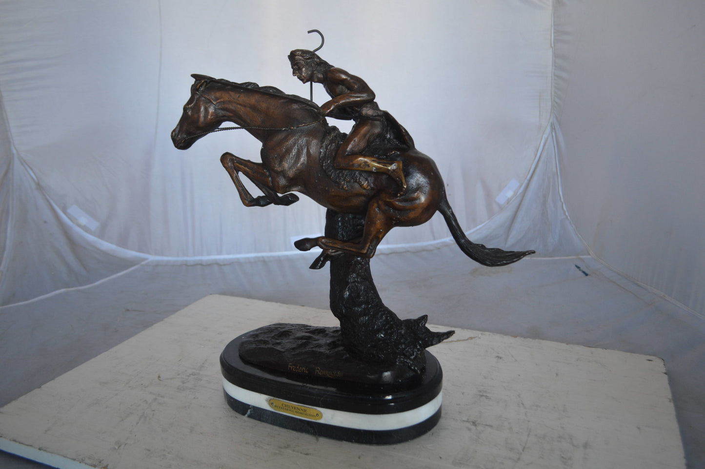 Cheyenne by Remington Bronze Statue replica - Size: 12"L x 7"W x 19"H.