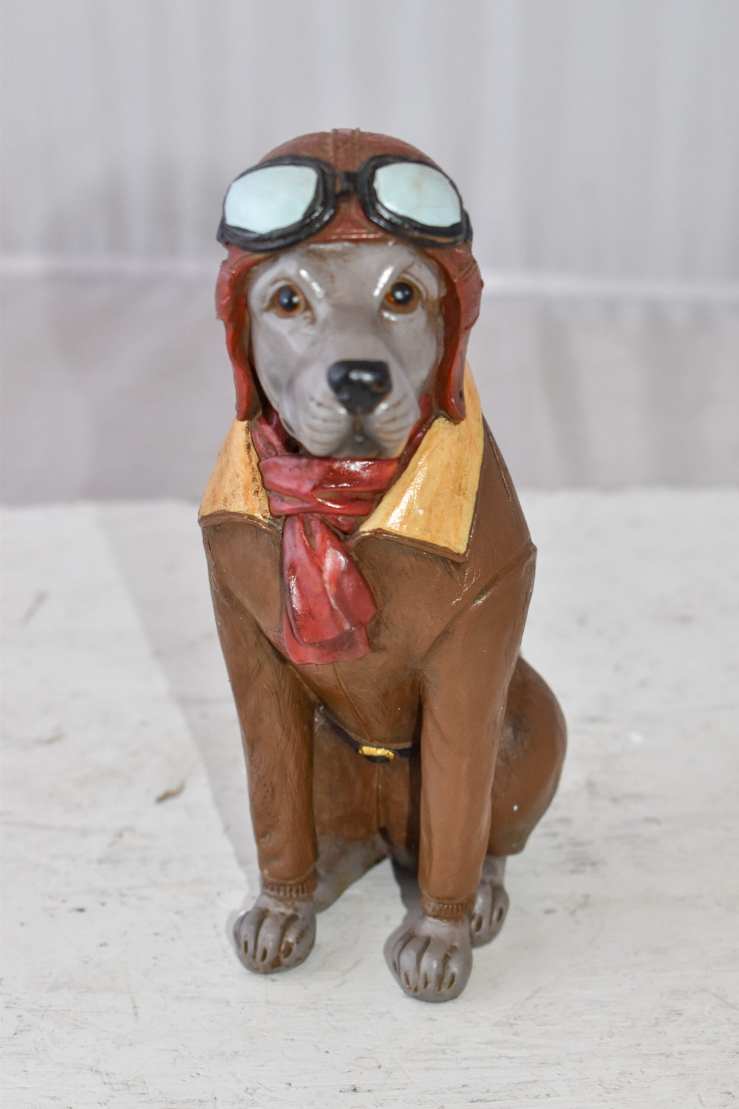A Happy Dog Dressed Like a Pilot Resin Statue Size: 3" x 4" x 8"H