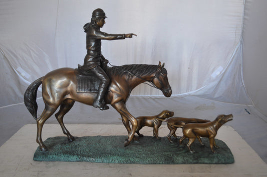 Hunter with three dogs Bronze Statue -  Size: 27"L x 6"W x 18"H.