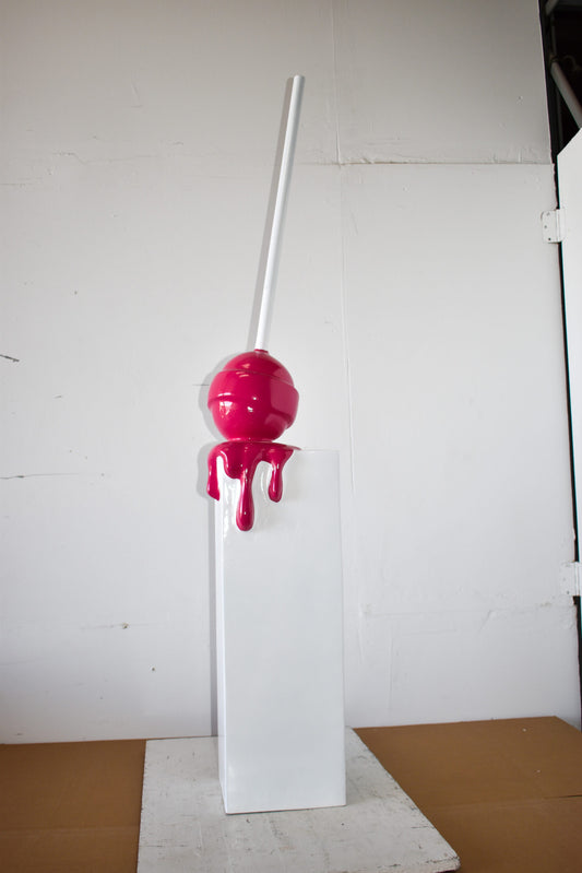 Red Lollipop Mounted on A White Pedestal Resin Statue Size: 10" x 10" x 59"H