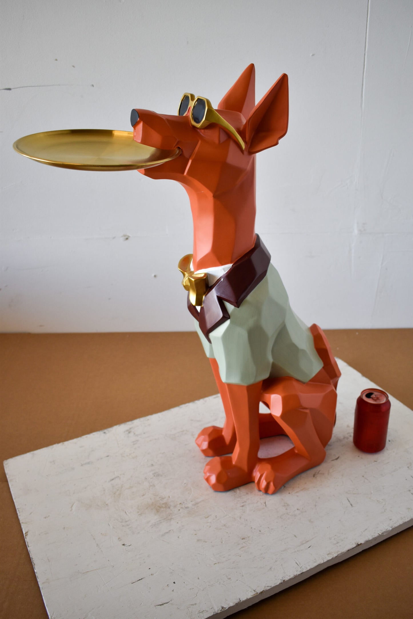 Happy Hostess Dog Resin Statue with Orange and White Finish 19" x 9" x 28"H