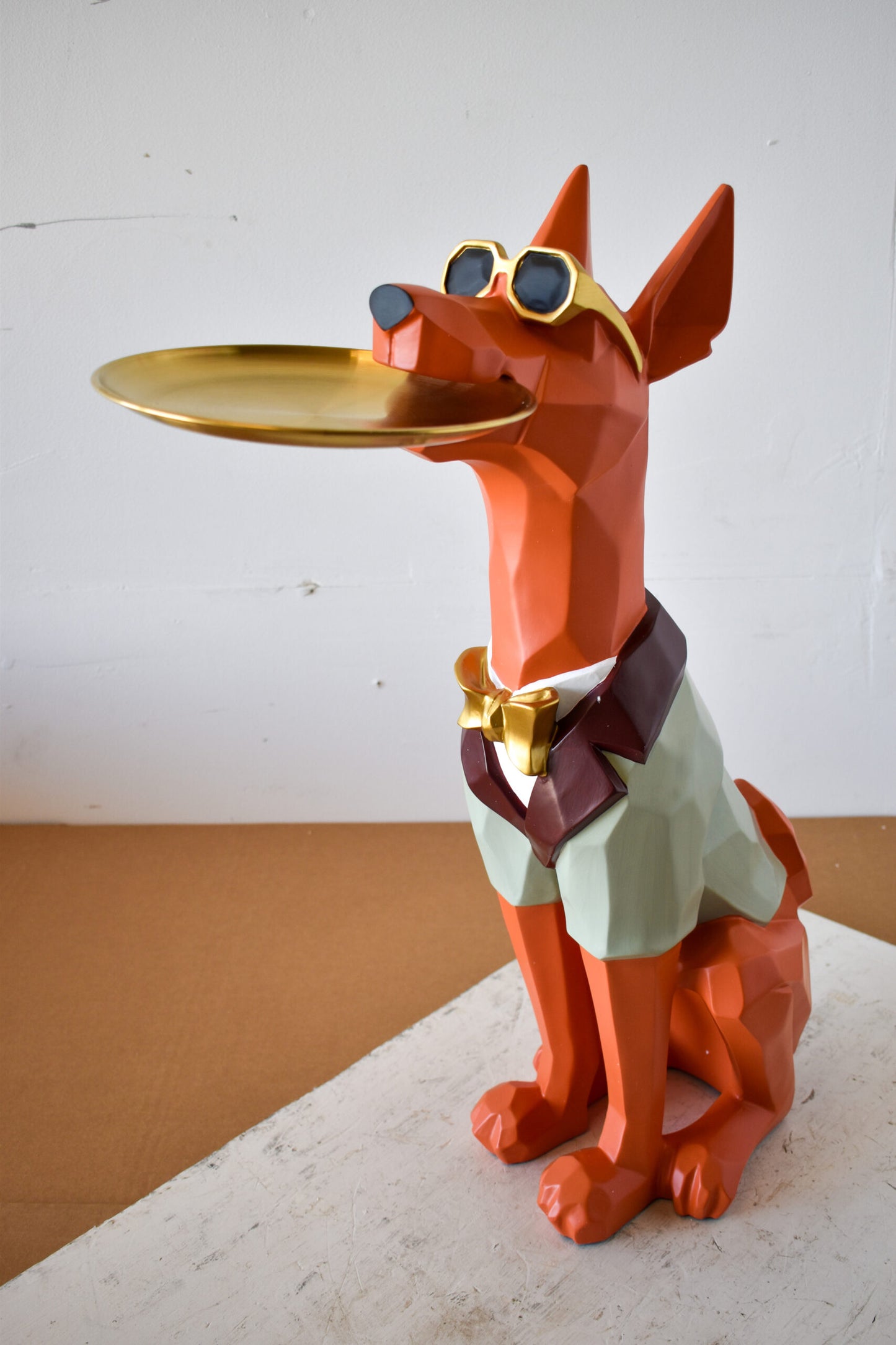 Happy Hostess Dog Resin Statue with Orange and White Finish 19" x 9" x 28"H