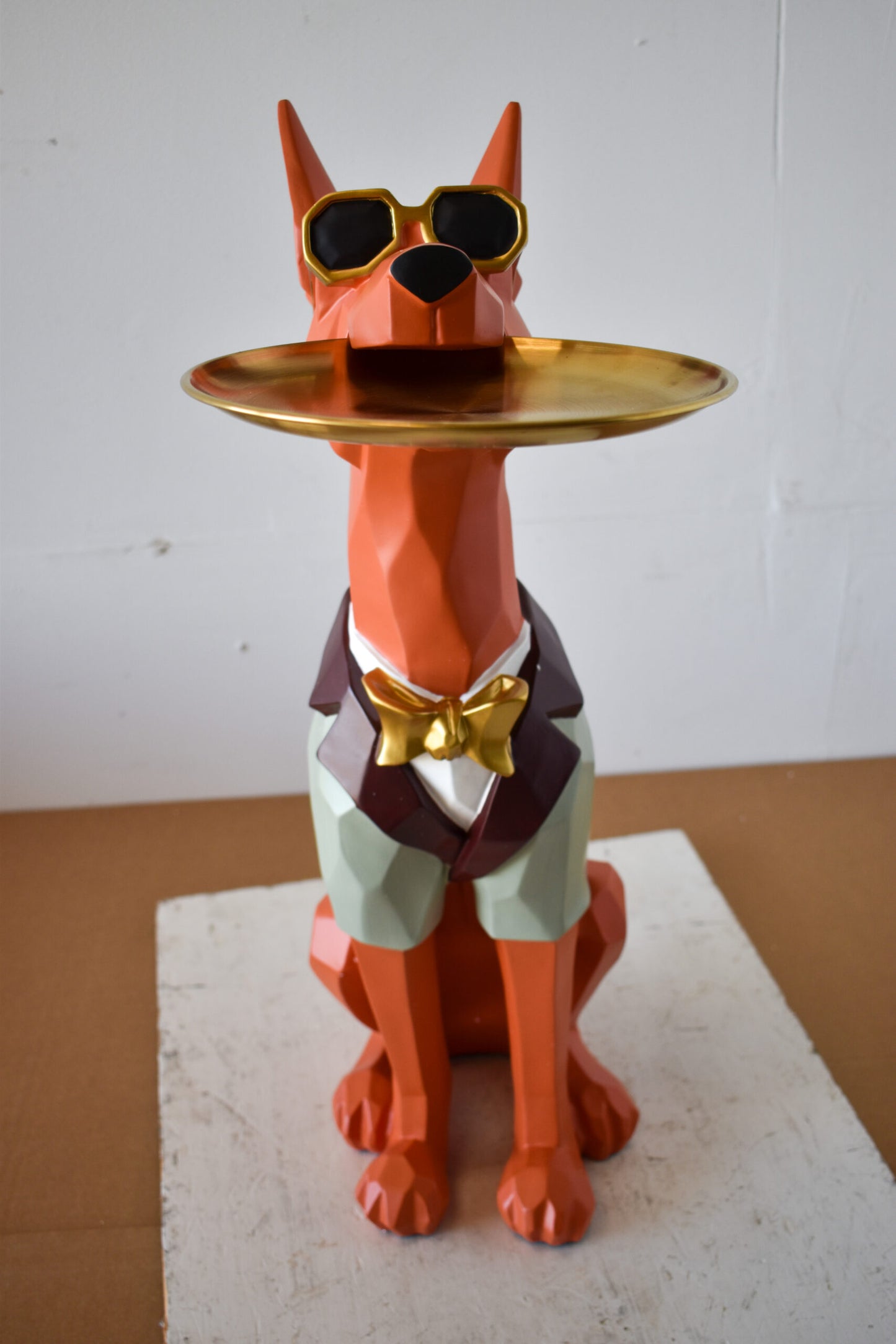 Happy Hostess Dog Resin Statue with Orange and White Finish 19" x 9" x 28"H