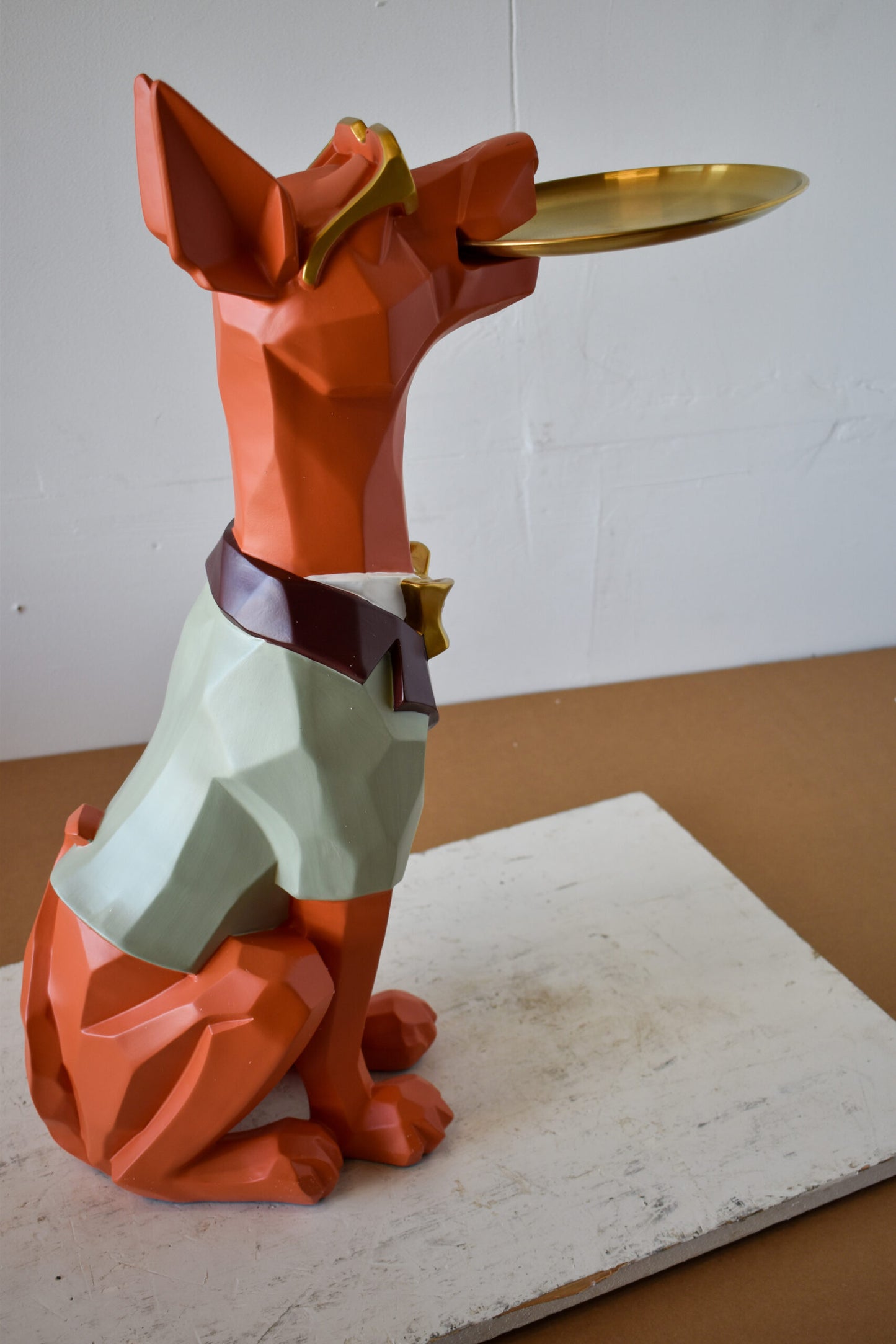 Happy Hostess Dog Resin Statue with Orange and White Finish 19" x 9" x 28"H