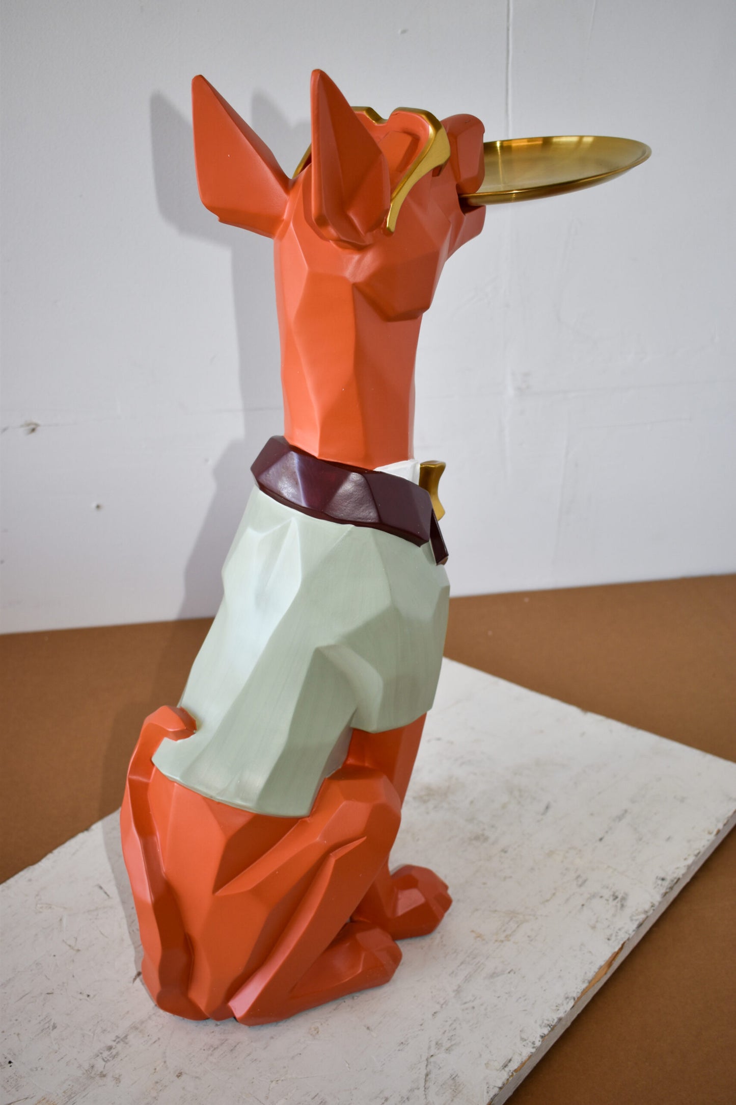 Happy Hostess Dog Resin Statue with Orange and White Finish 19" x 9" x 28"H