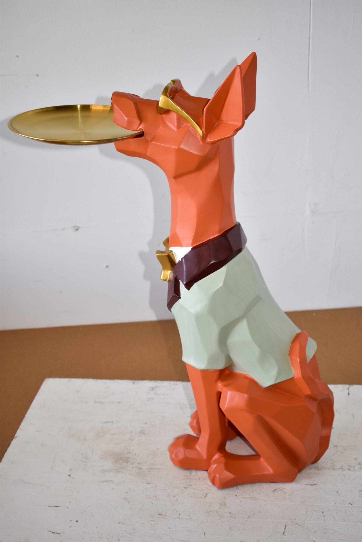 Happy Hostess Dog Resin Statue with Orange and White Finish 19" x 9" x 28"H