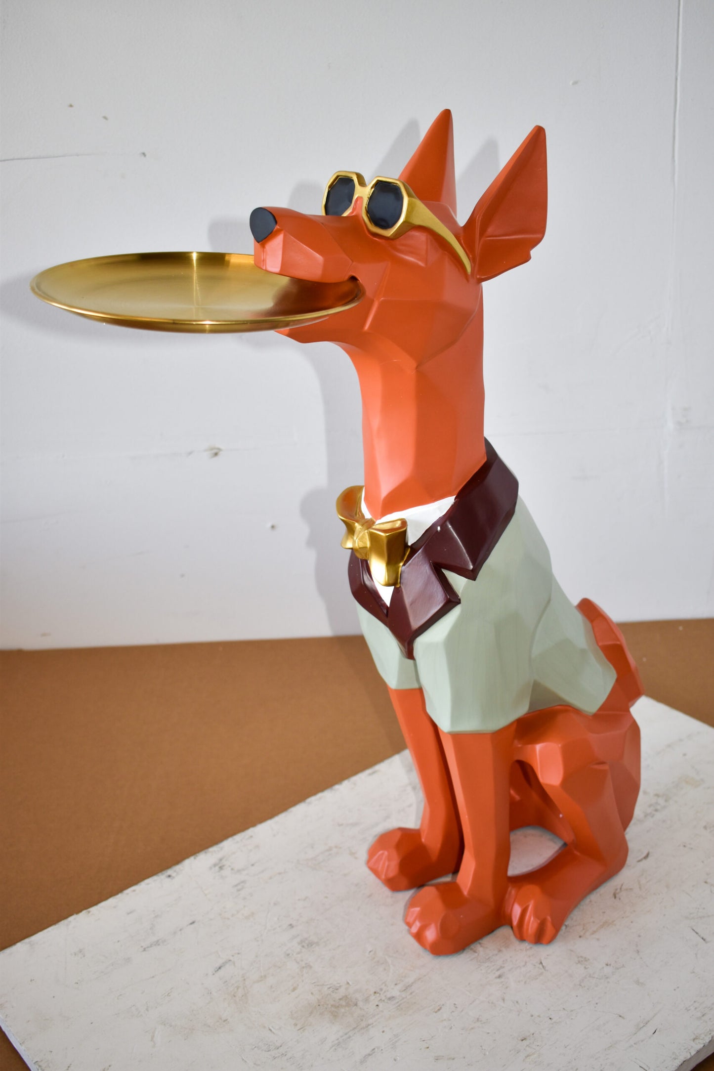 Happy Hostess Dog Resin Statue with Orange and White Finish 19" x 9" x 28"H