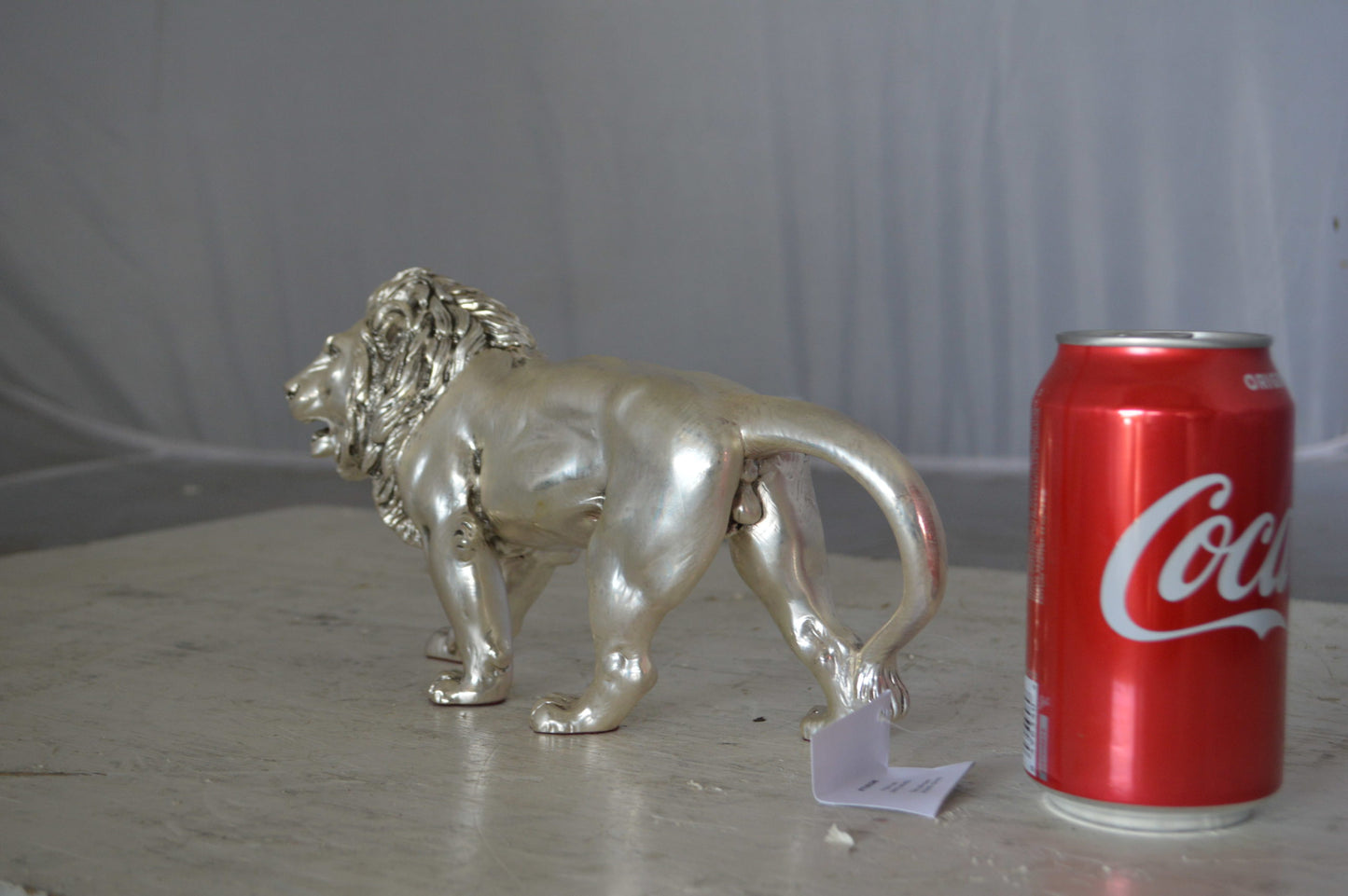 Walking Lion made of resin statue - Size: 10"L x 3"W x 6"H.