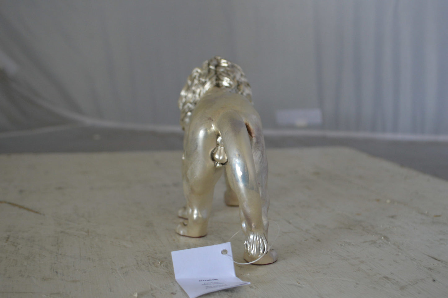 Walking Lion made of resin statue - Size: 10"L x 3"W x 6"H.