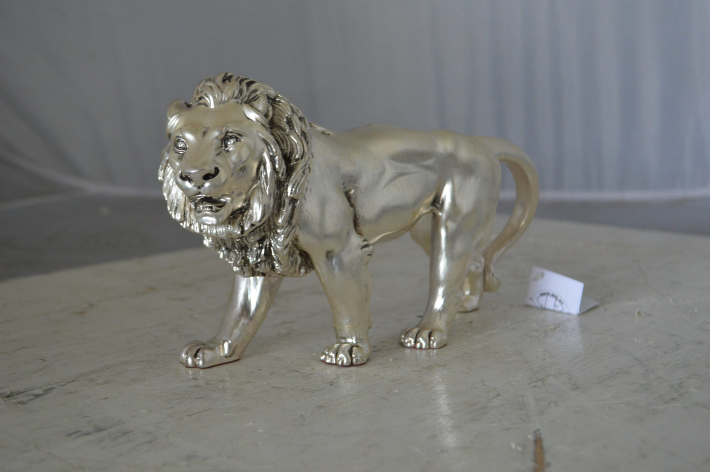 Walking Lion made of resin statue - Size: 10"L x 3"W x 6"H.