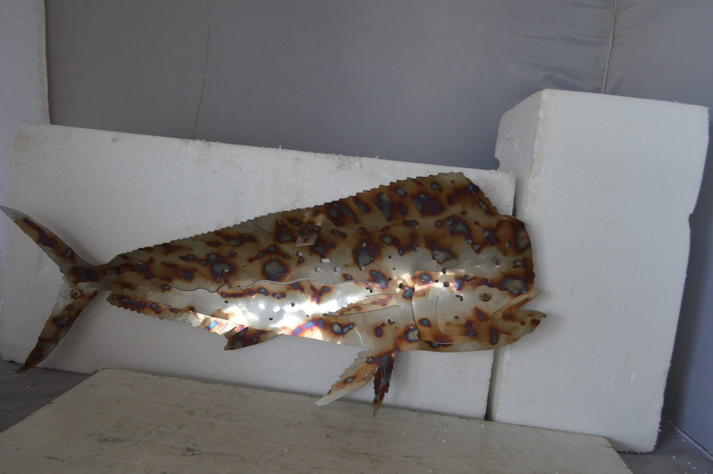 Mahi Mahi laser cut steel wall mounted - Size: 33"L x 2"W x 13"H.