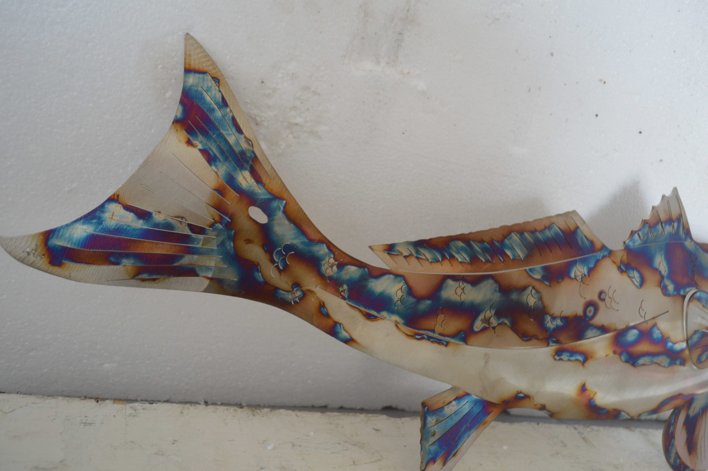 Fish laser cut steel wall mounted - Size: 25"L x 2"W x 9"H.