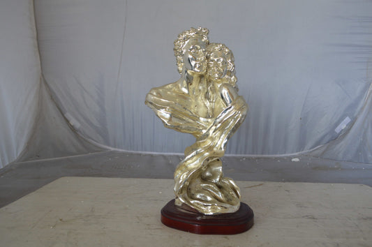 Lovers resin statue on wood base - Size: 8"L x 5"W x 14"H.