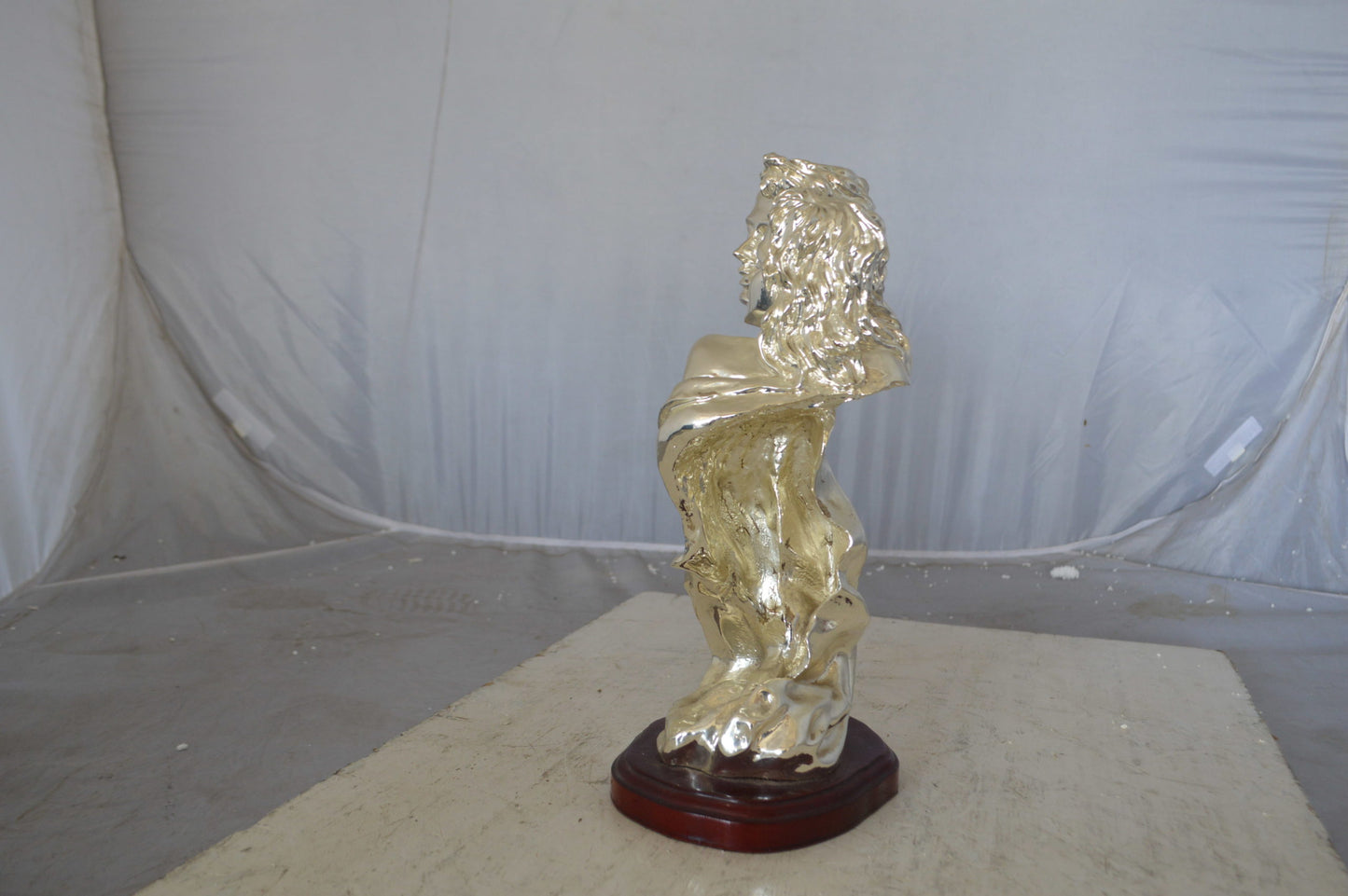 Lovers resin statue on wood base - Size: 8"L x 5"W x 14"H.