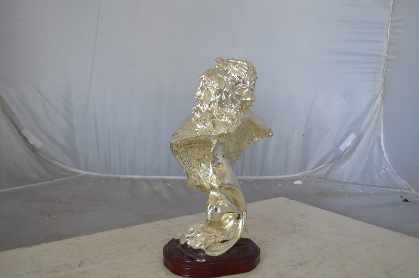 Lovers resin statue on wood base - Size: 8"L x 5"W x 14"H.