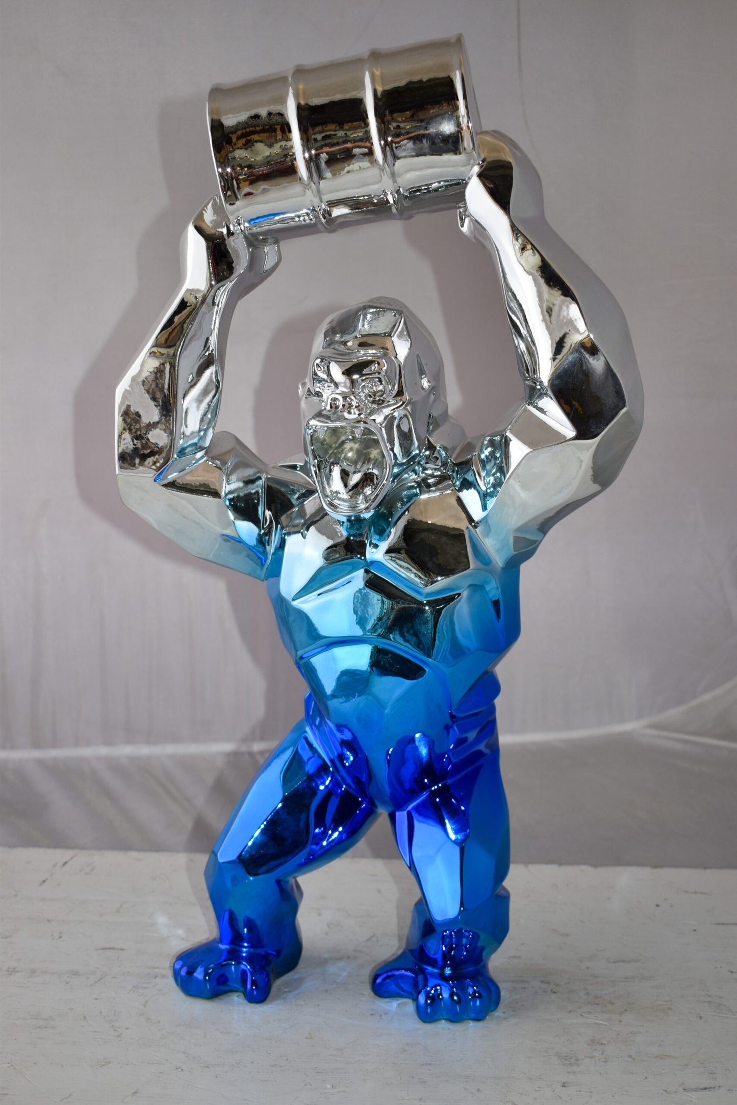 Textile Blue and Silver King Kong with A Barrell Statue Size: 14" x 7" x 24"H