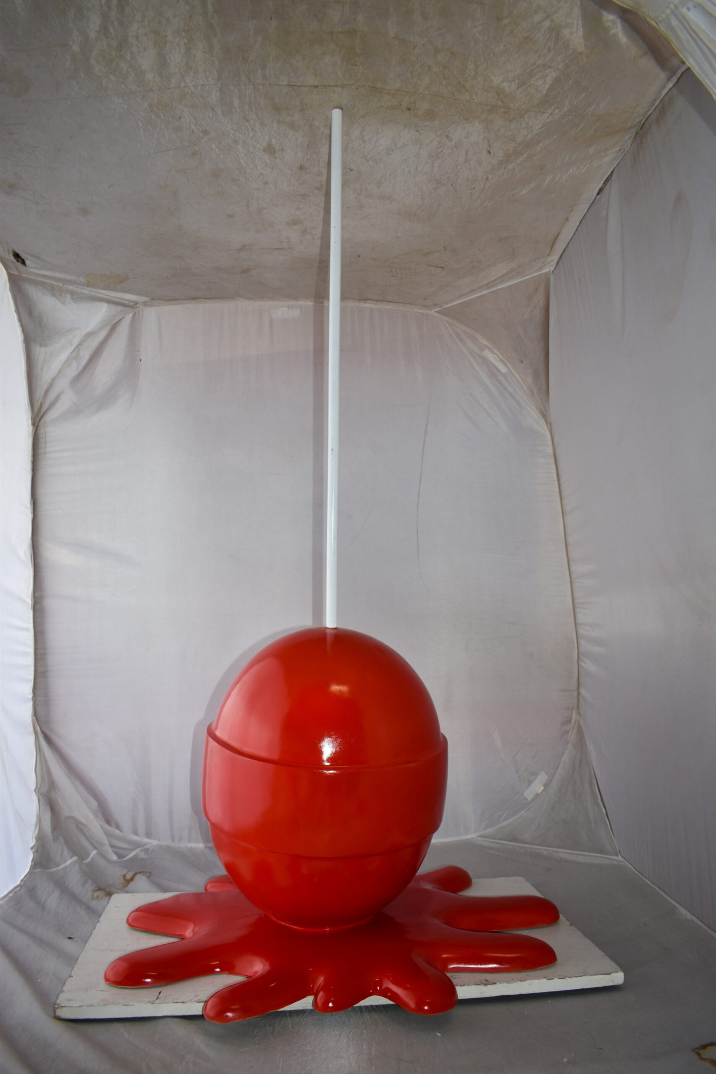 Giant Red Lollipop Melted on The Ground Resin Statue Size: 31" x 27" x 56"H
