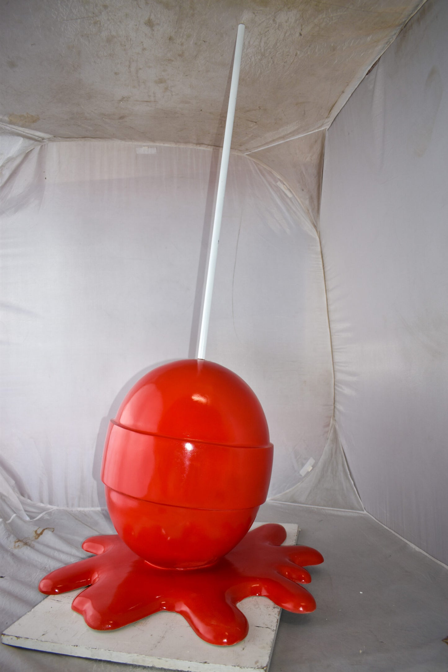 Giant Red Lollipop Melted on The Ground Resin Statue Size: 31" x 27" x 56"H