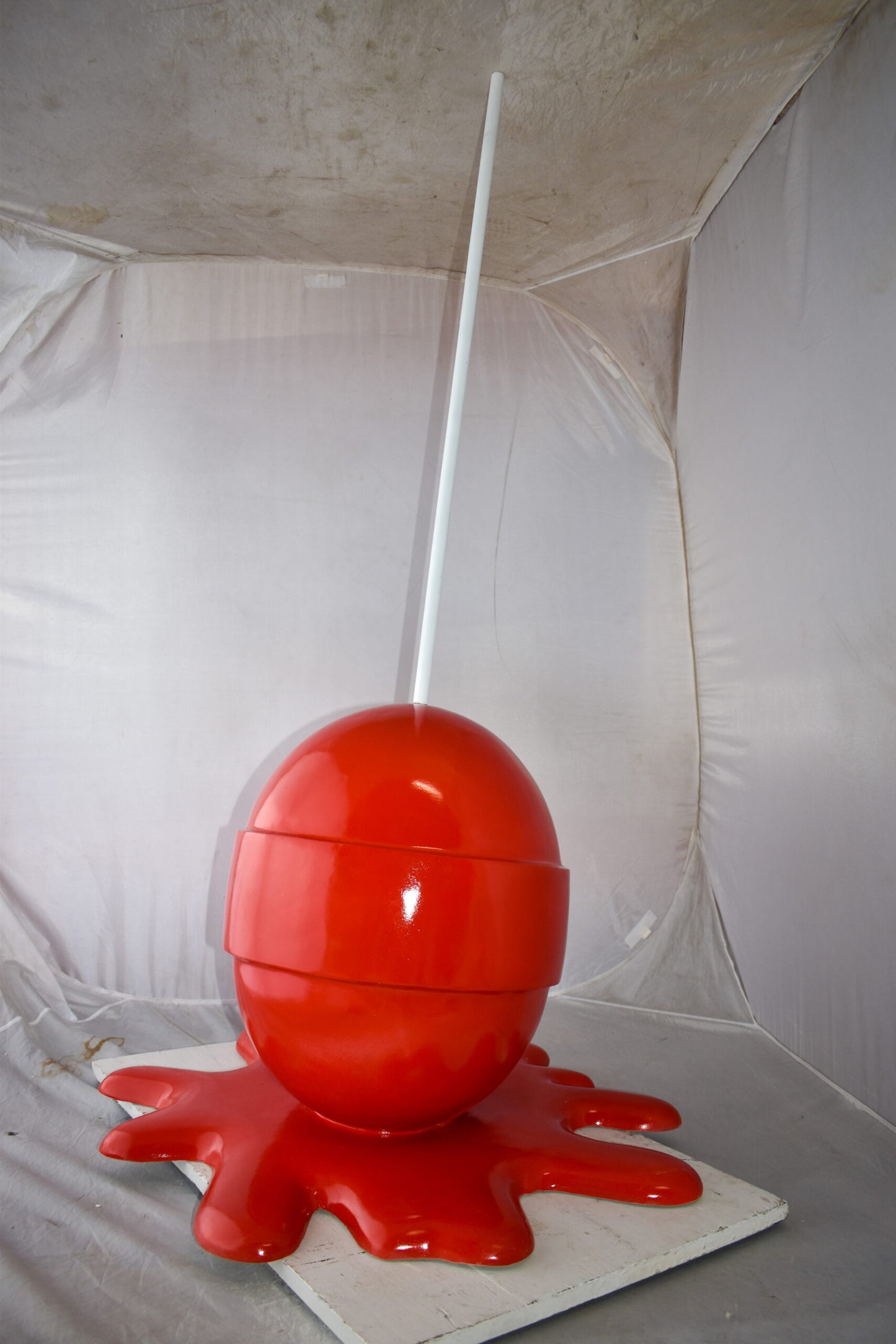 Giant Red Lollipop Melted on The Ground Resin Statue Size: 31" x 27" x 56"H