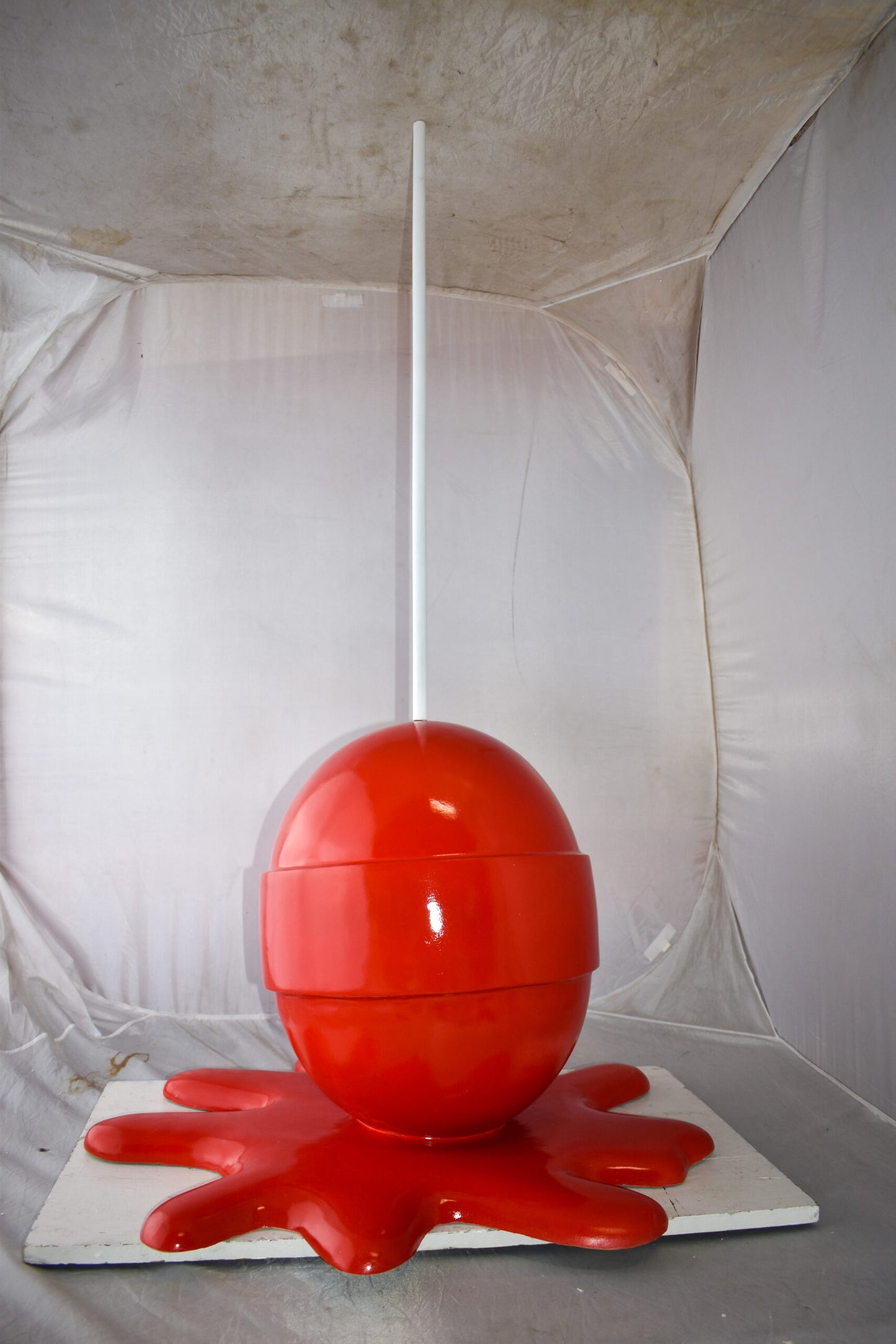 Giant Red Lollipop Melted on The Ground Resin Statue Size: 31" x 27" x 56"H