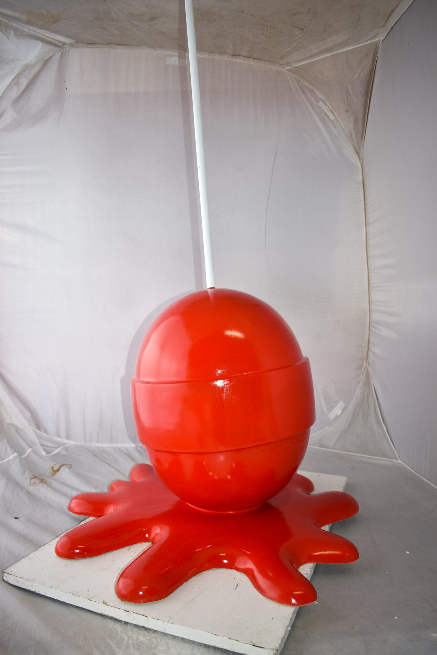 Giant Red Lollipop Melted on The Ground Resin Statue Size: 31" x 27" x 56"H