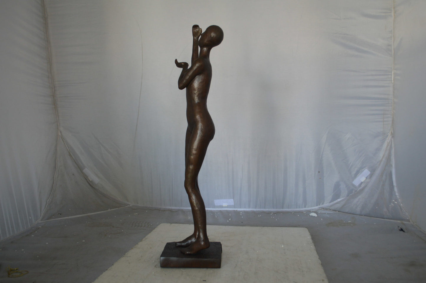 Abstract of Art nude lady lifting hand bronze statue - Size: 9"L x 6"W x 25"H.