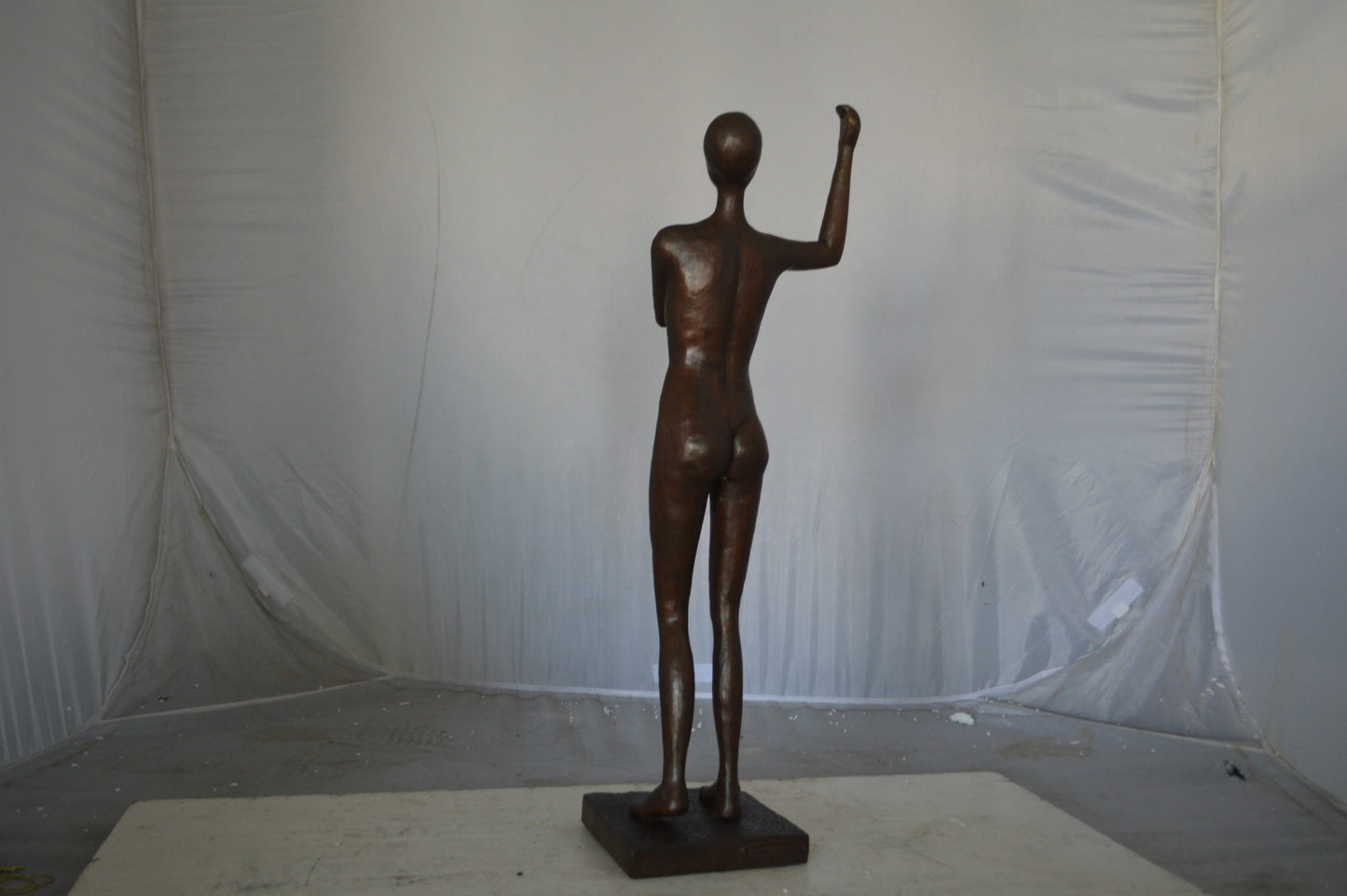 Abstract of Art nude lady lifting hand bronze statue - Size: 9"L x 6"W x 25"H.