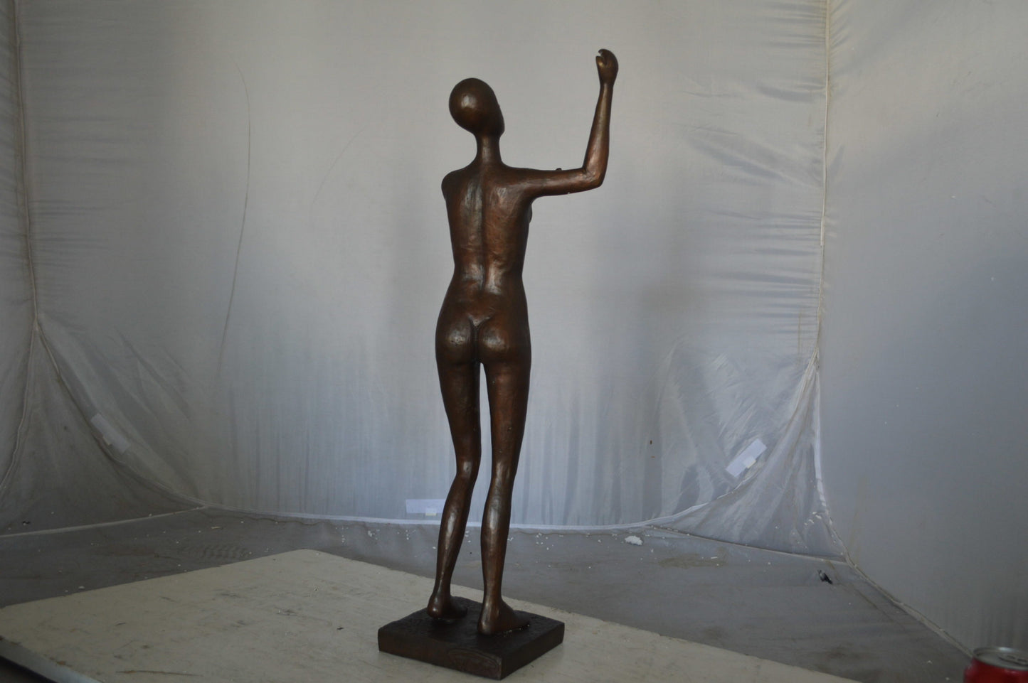 Abstract of Art nude lady lifting hand bronze statue - Size: 9"L x 6"W x 25"H.