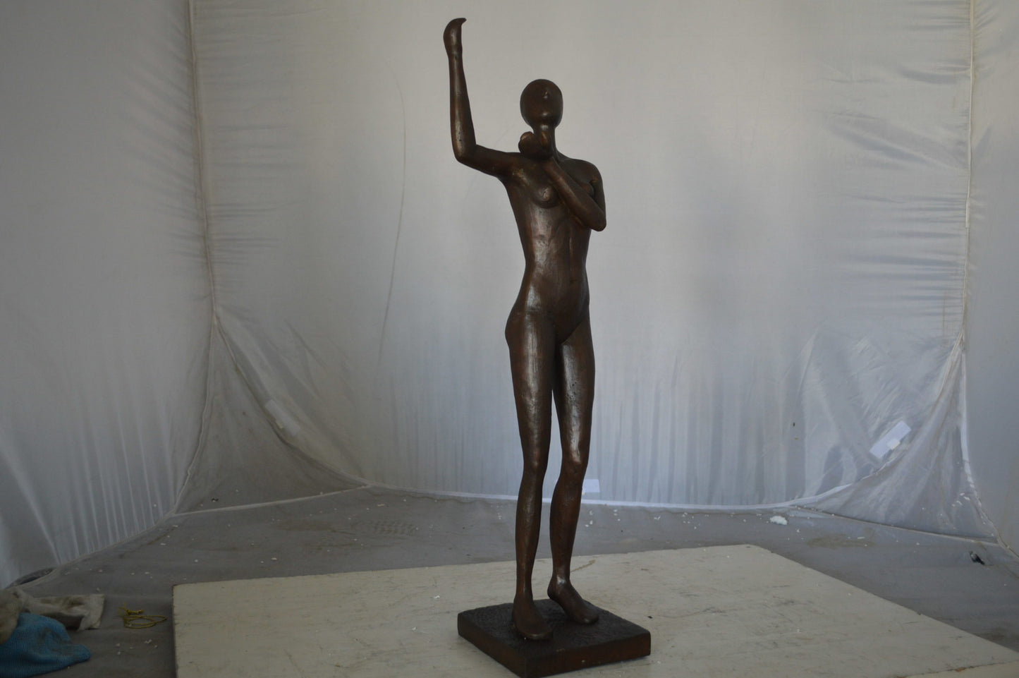 Abstract of Art nude lady lifting hand bronze statue - Size: 9"L x 6"W x 25"H.