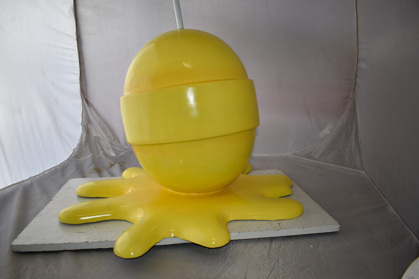 Giant Yellow Lollipop Melted on The Ground Resin Statue Size: 31" x 27" x 56"H