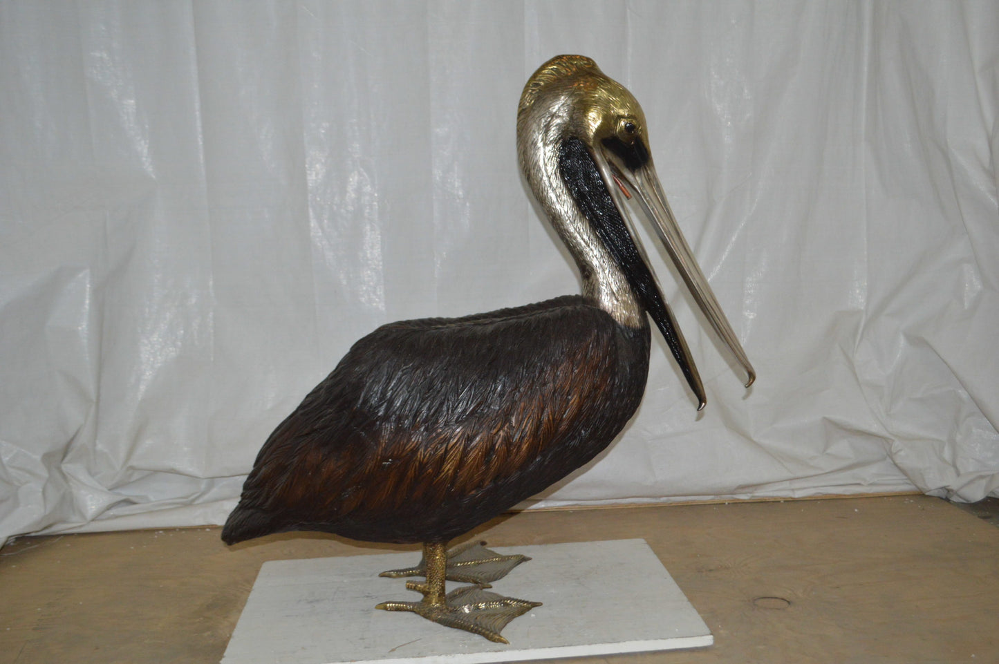 Upright Pelican Bronze Statue Fountain - Size: 46"L x 20"W x 44"H.