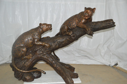 Two Jaguars On A Tree Bronze Statue - Size: 66"L x 34"W x 44"H.