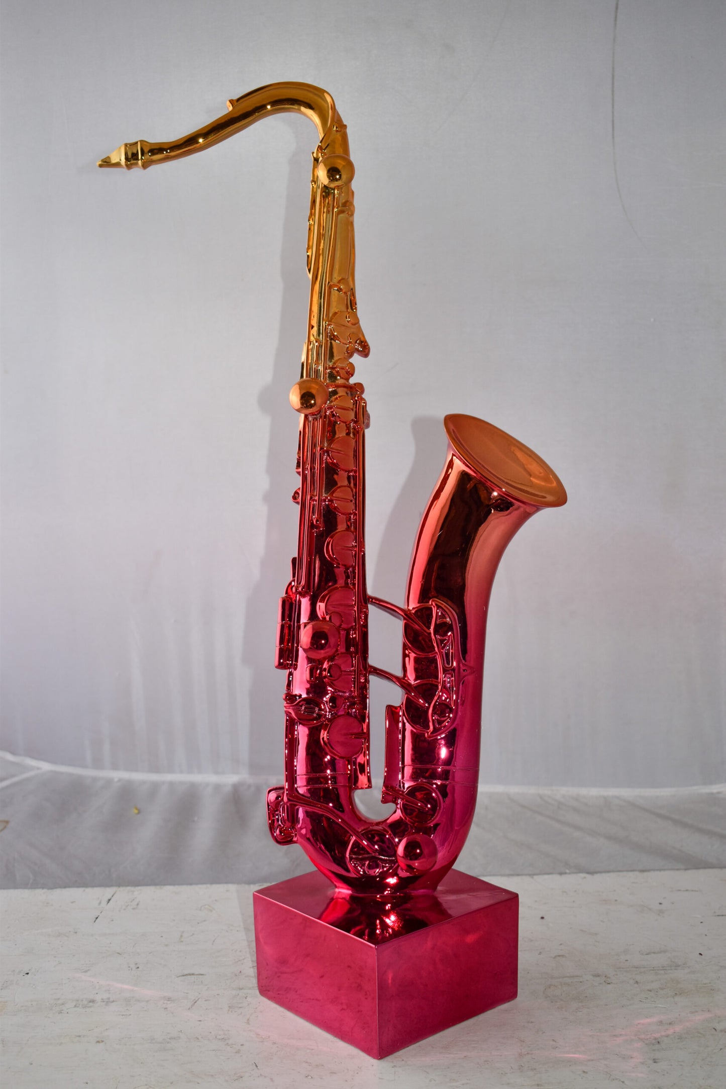 Modern Art Pink and Gold Saxophone Statue Made of Resin Size: 10" x 8" x 28"H