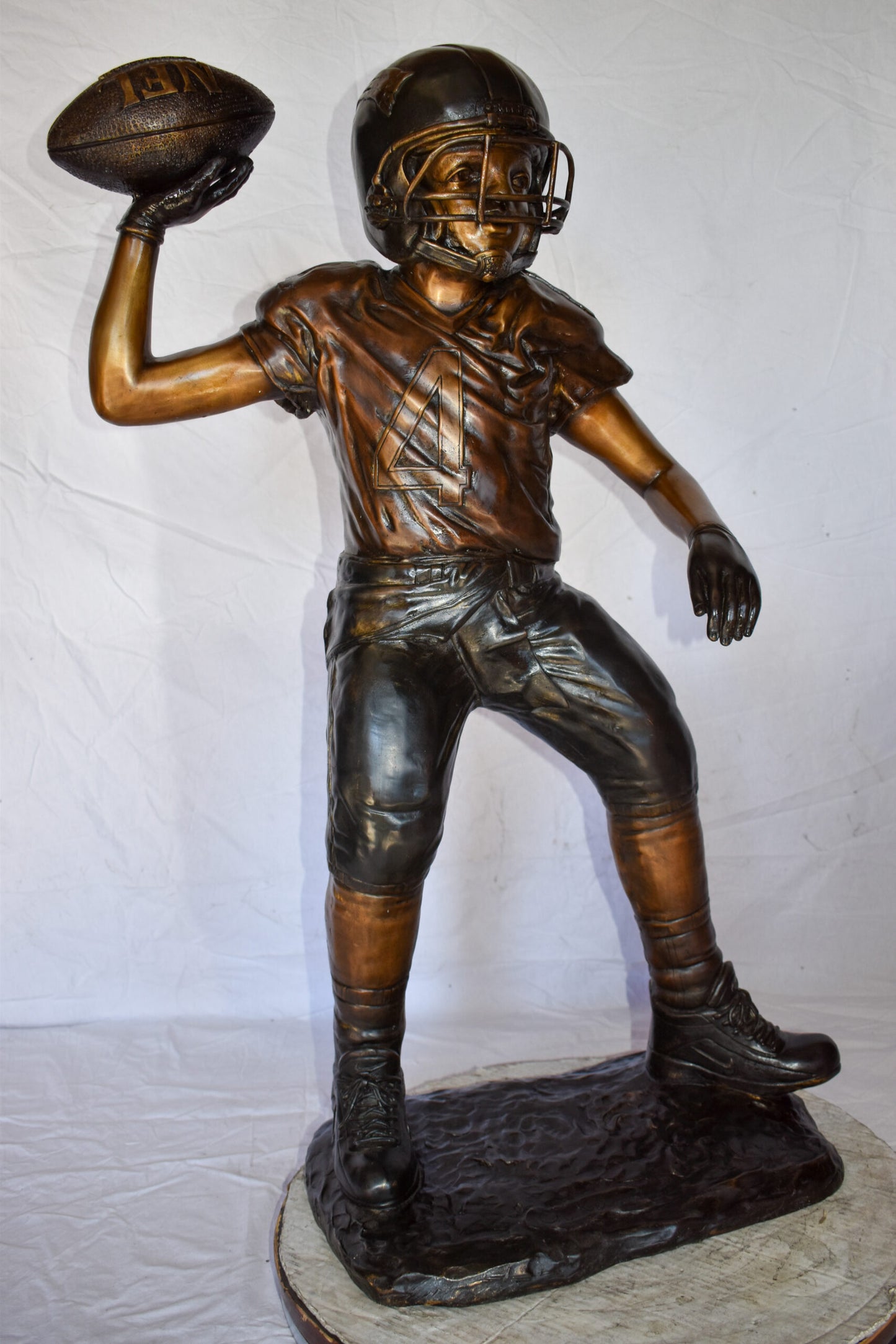 Young Boy Playing Football Bronze Statue Size: 26" x 14" x 43"H