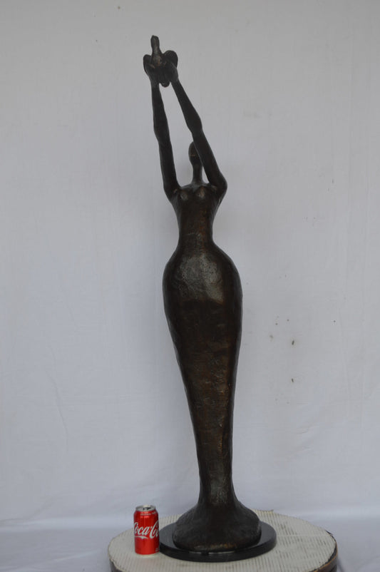 Woman Releasing Bird Modern Art Bronze Statue - Size: 13"L x 19"W x 52"H.
