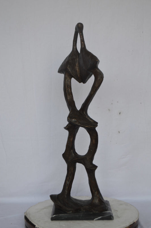 Modern art abstract, a couple kissing bronze statue - Size: 13"L x 11"W x 40"H.