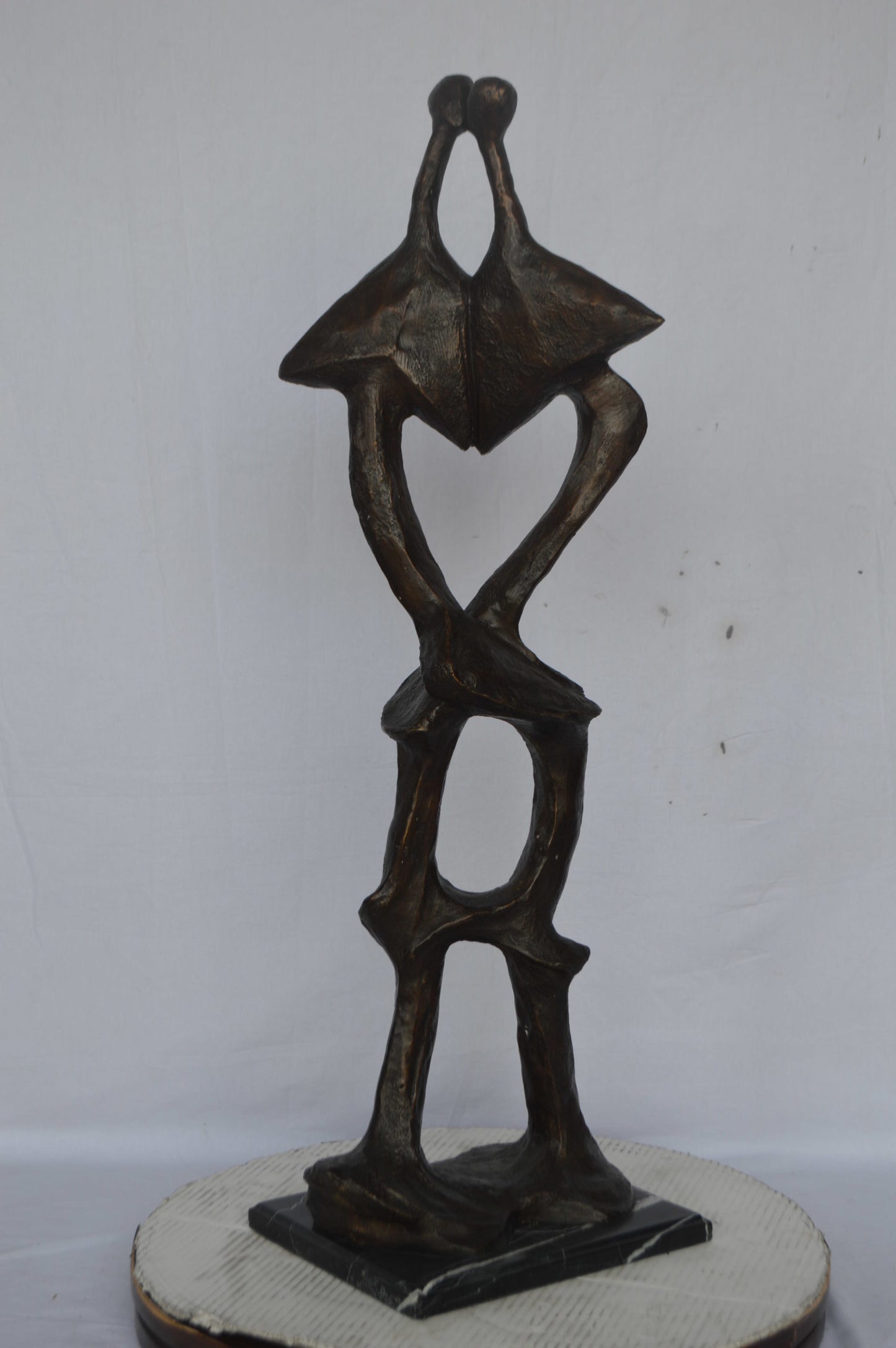 Modern art abstract, a couple kissing bronze statue - Size: 13"L x 11"W x 40"H.