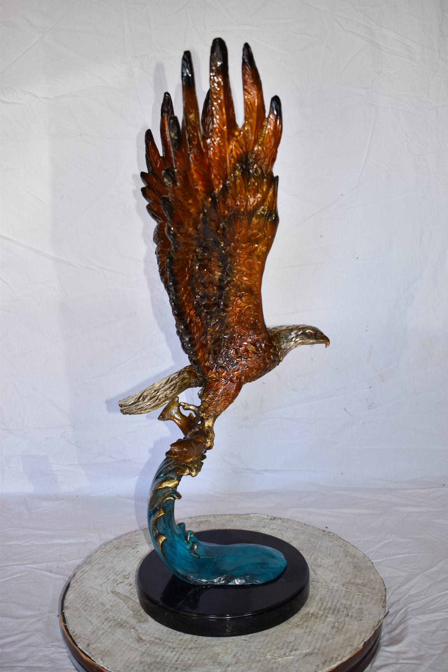 Eagle In Action Catching a Fish from Water Bronze Statue Size: 18" x 17" x 37"H