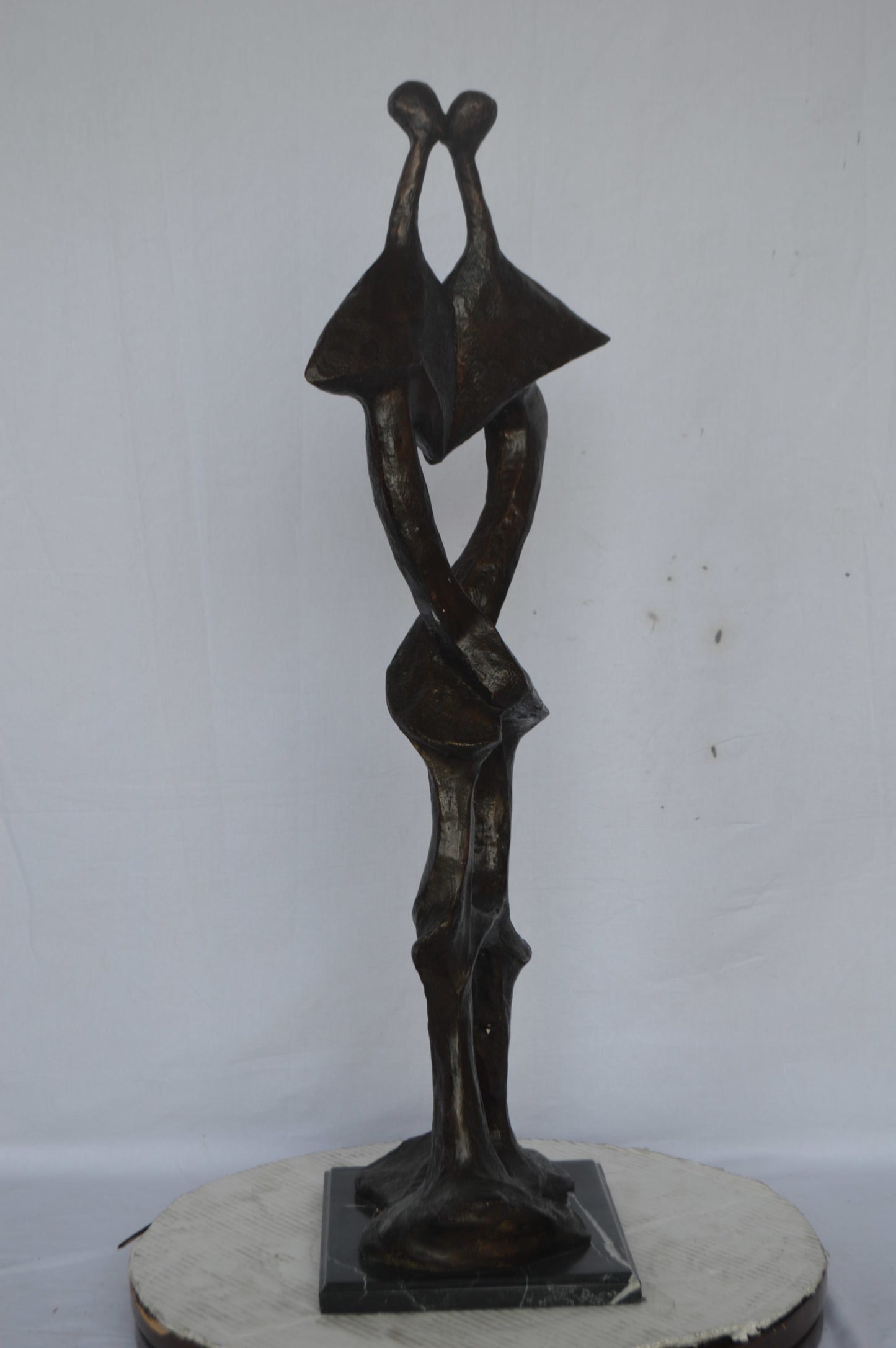 Modern art abstract, a couple kissing bronze statue - Size: 13"L x 11"W x 40"H.